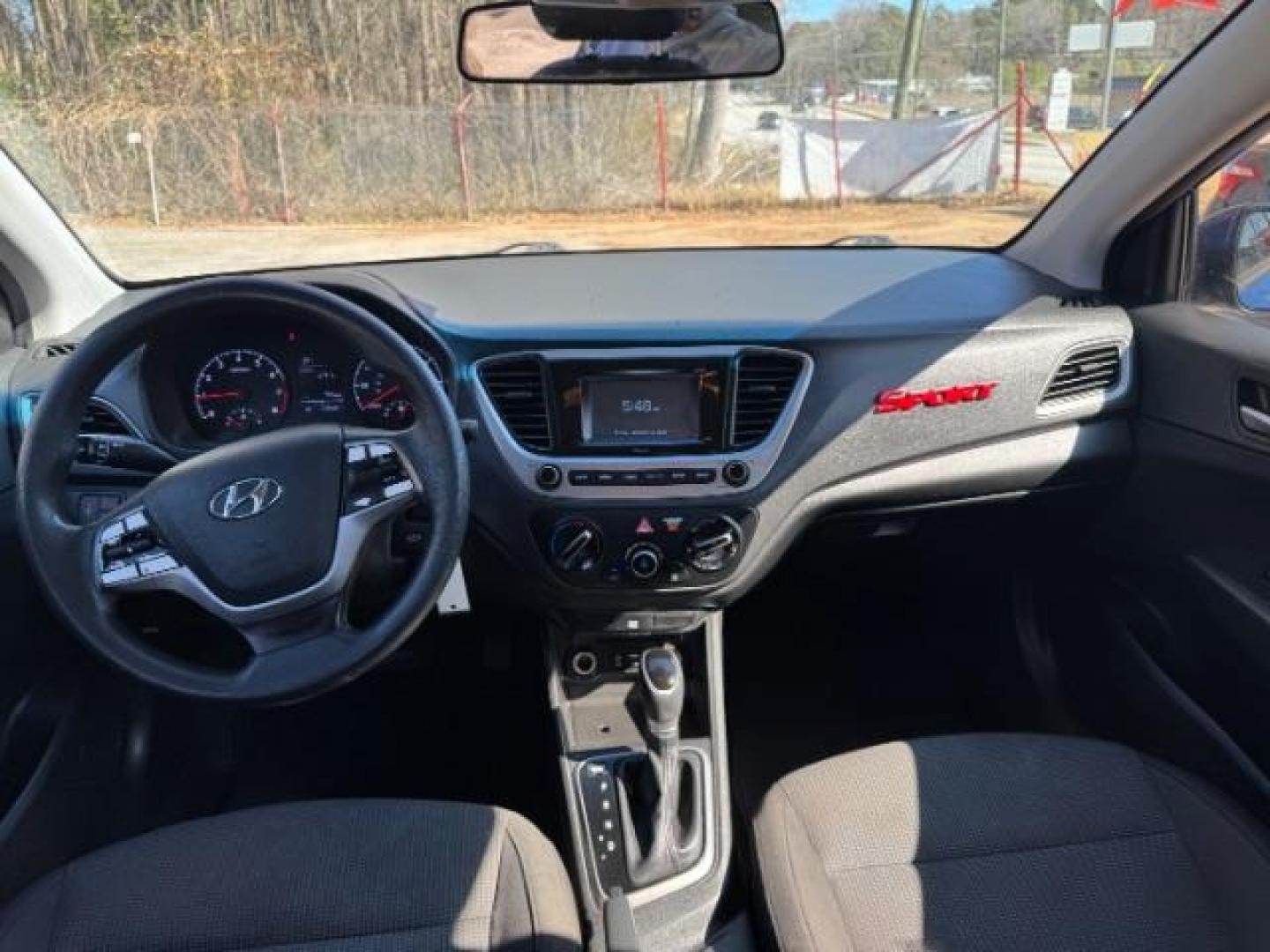 2018 Blue Hyundai Accent SE 4-Door 6A (3KPC24A32JE) with an 1.6L L4 DOHC 16V engine, 6-Speed Automatic transmission, located at 1806 Veterans Memorial Hwy SW, Austell, GA, 30168, (770) 944-9558, 33.817959, -84.606987 - Photo#11