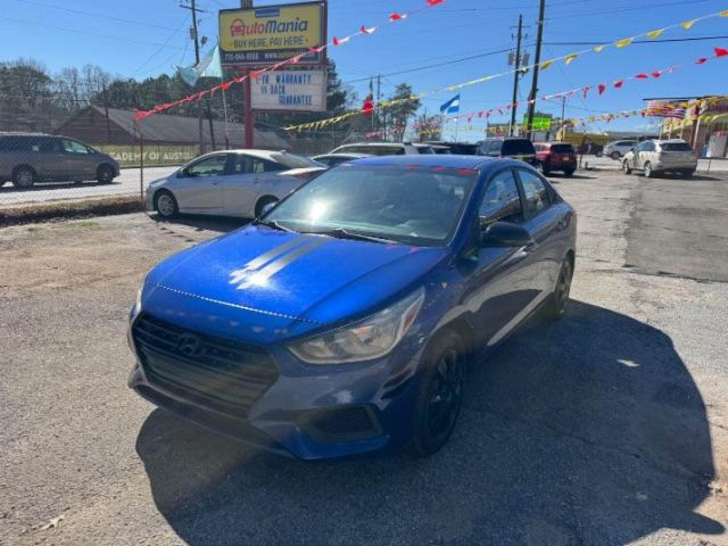 2018 Blue Hyundai Accent SE 4-Door 6A (3KPC24A32JE) with an 1.6L L4 DOHC 16V engine, 6-Speed Automatic transmission, located at 1806 Veterans Memorial Hwy SW, Austell, GA, 30168, (770) 944-9558, 33.817959, -84.606987 - Photo#0