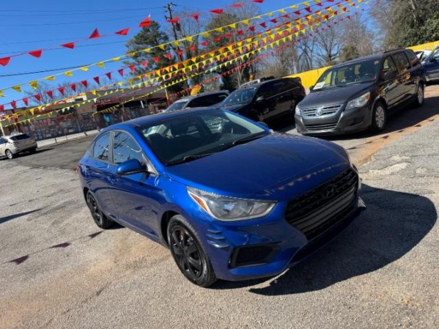 2018 Blue Hyundai Accent SE 4-Door 6A (3KPC24A32JE) with an 1.6L L4 DOHC 16V engine, 6-Speed Automatic transmission, located at 1806 Veterans Memorial Hwy SW, Austell, GA, 30168, (770) 944-9558, 33.817959, -84.606987 - Photo#2