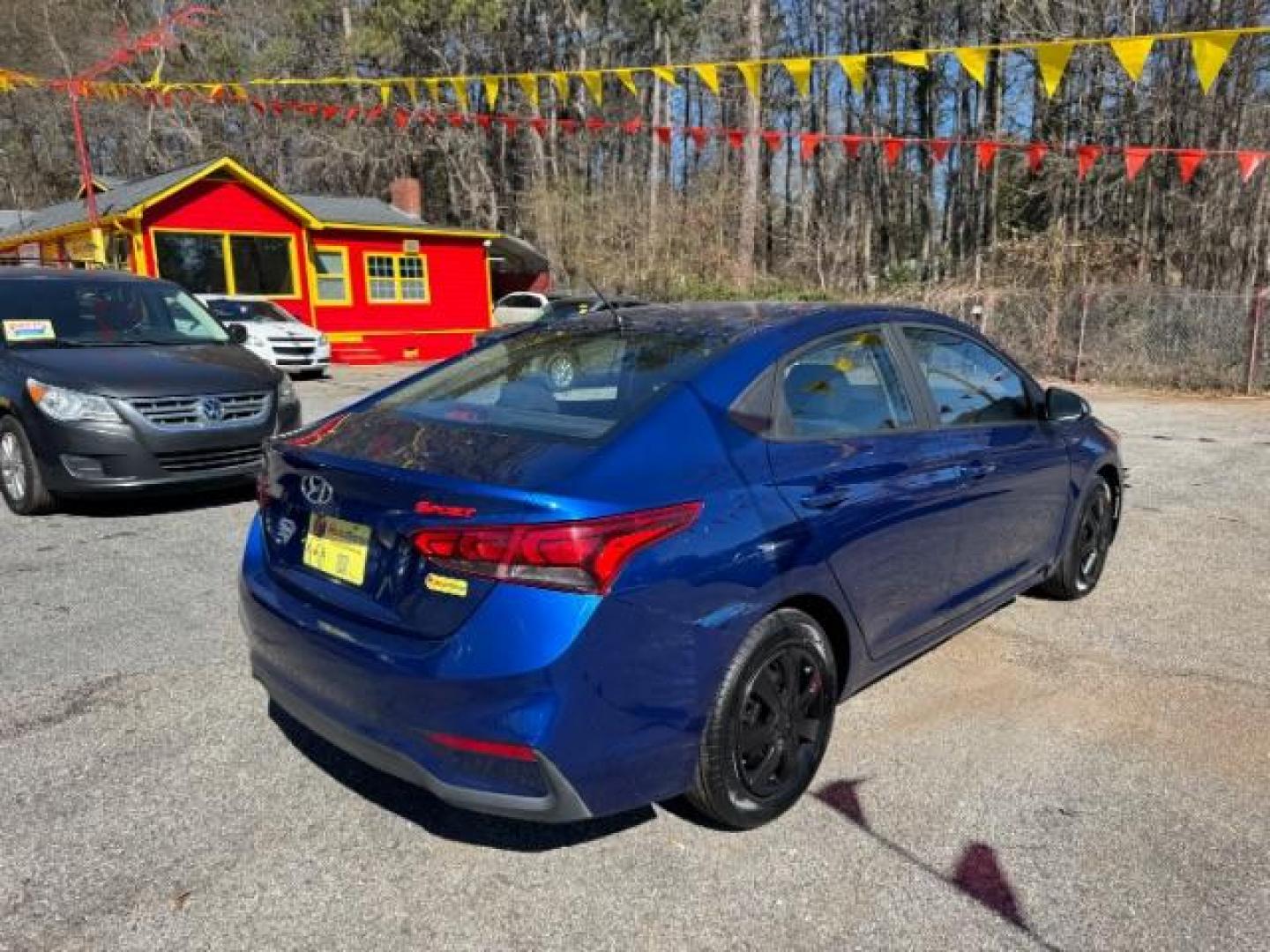 2018 Blue Hyundai Accent SE 4-Door 6A (3KPC24A32JE) with an 1.6L L4 DOHC 16V engine, 6-Speed Automatic transmission, located at 1806 Veterans Memorial Hwy SW, Austell, GA, 30168, (770) 944-9558, 33.817959, -84.606987 - Photo#3