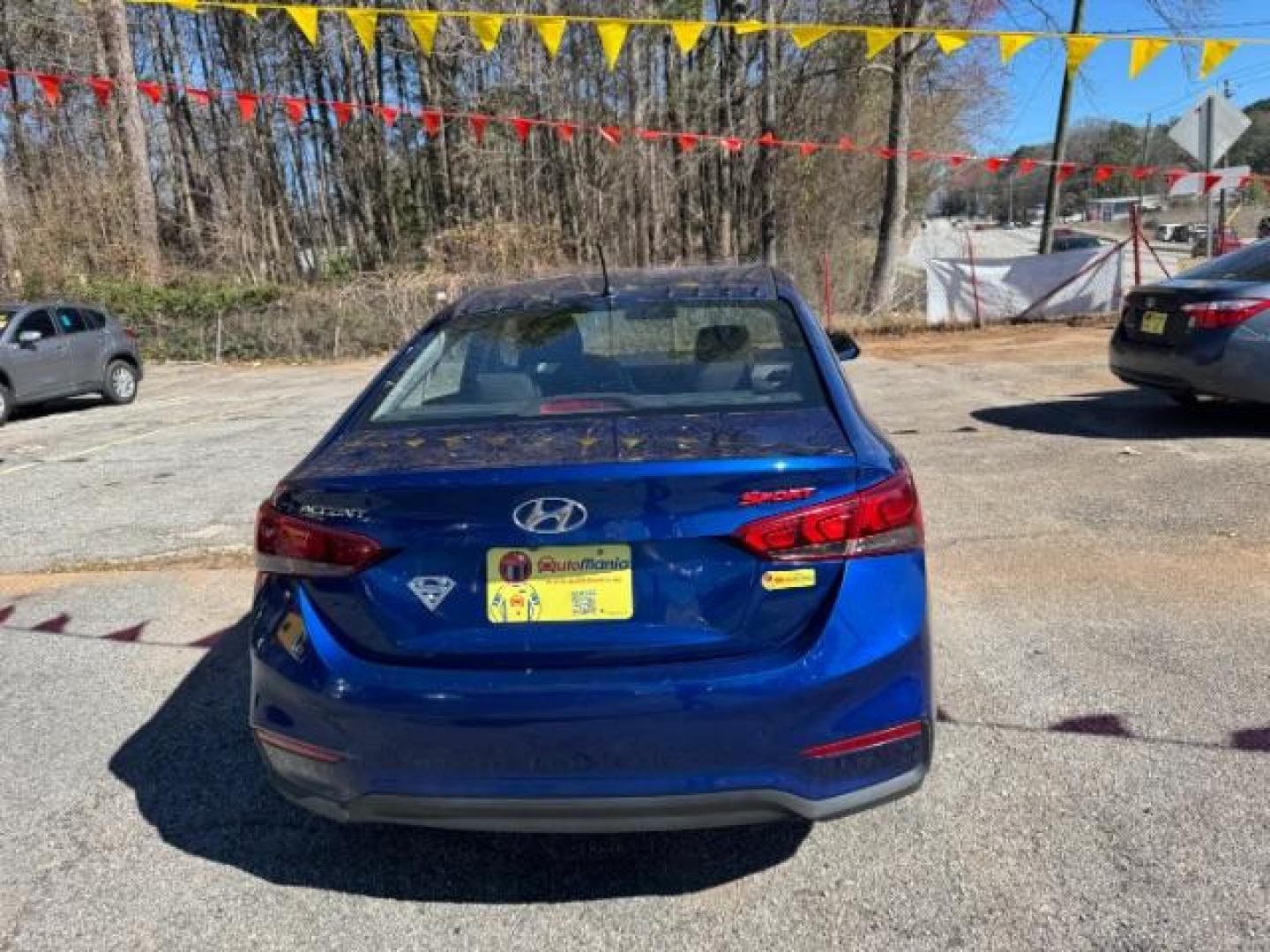 2018 Blue Hyundai Accent SE 4-Door 6A (3KPC24A32JE) with an 1.6L L4 DOHC 16V engine, 6-Speed Automatic transmission, located at 1806 Veterans Memorial Hwy SW, Austell, GA, 30168, (770) 944-9558, 33.817959, -84.606987 - Photo#4