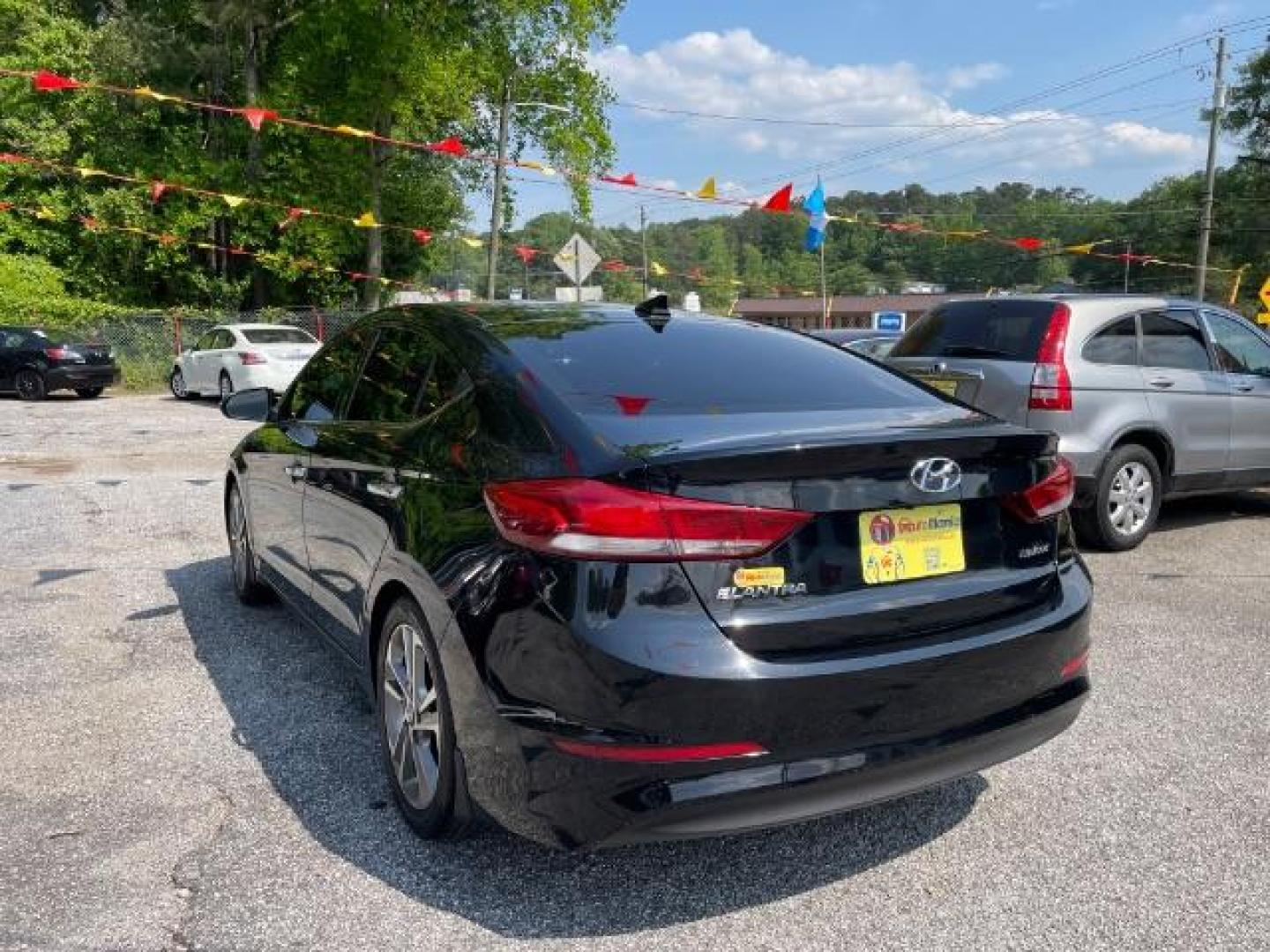 2017 Black Hyundai Elantra Limited (5NPD84LFXHH) with an 1.8L L4 DOHC 16V engine, 6-Speed Automatic transmission, located at 1806 Veterans Memorial Hwy SW, Austell, GA, 30168, (770) 944-9558, 33.817959, -84.606987 - Photo#6