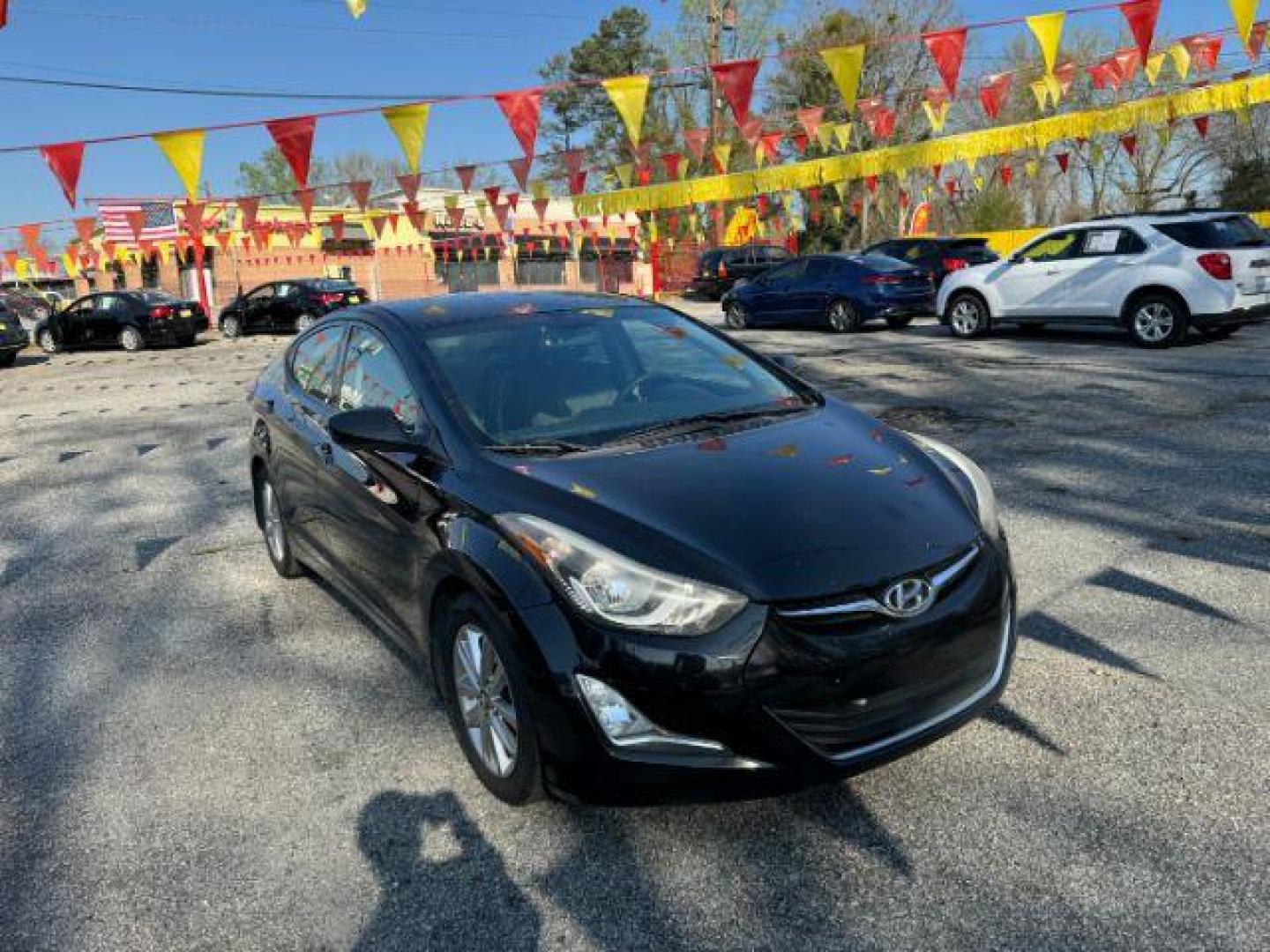 2015 Black Hyundai Elantra SE 6AT (KMHDH4AE0FU) with an 1.8L L4 DOHC 16V engine, 6-Speed Automatic transmission, located at 1806 Veterans Memorial Hwy SW, Austell, GA, 30168, (770) 944-9558, 33.817959, -84.606987 - Photo#2