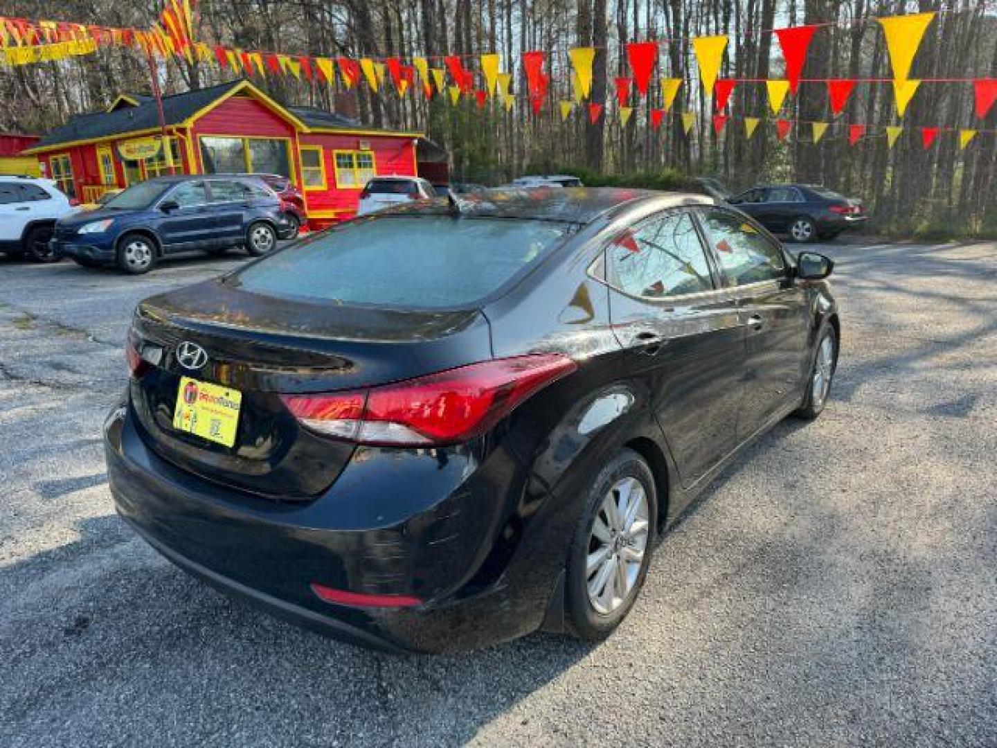 2015 Black Hyundai Elantra SE 6AT (KMHDH4AE0FU) with an 1.8L L4 DOHC 16V engine, 6-Speed Automatic transmission, located at 1806 Veterans Memorial Hwy SW, Austell, GA, 30168, (770) 944-9558, 33.817959, -84.606987 - Photo#3