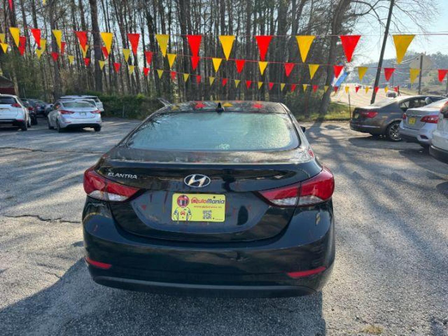 2015 Black Hyundai Elantra SE 6AT (KMHDH4AE0FU) with an 1.8L L4 DOHC 16V engine, 6-Speed Automatic transmission, located at 1806 Veterans Memorial Hwy SW, Austell, GA, 30168, (770) 944-9558, 33.817959, -84.606987 - Photo#4