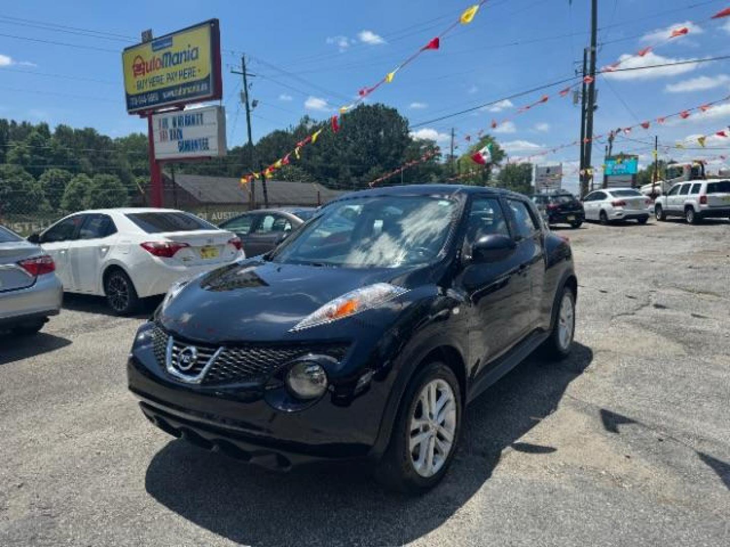 2014 Black Nissan Juke S FWD (JN8AF5MRXET) with an 1.6L L4 DOHC 16V TUR engine, Continuously Variabl transmission, located at 1806 Veterans Memorial Hwy SW, Austell, GA, 30168, (770) 944-9558, 33.817959, -84.606987 - Photo#0