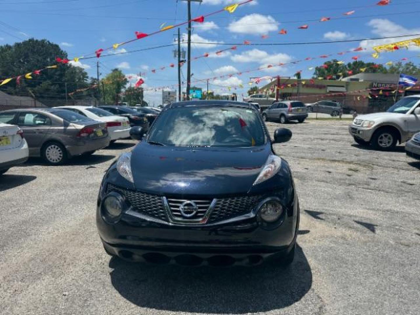 2014 Black Nissan Juke S FWD (JN8AF5MRXET) with an 1.6L L4 DOHC 16V TUR engine, Continuously Variabl transmission, located at 1806 Veterans Memorial Hwy SW, Austell, GA, 30168, (770) 944-9558, 33.817959, -84.606987 - Photo#1