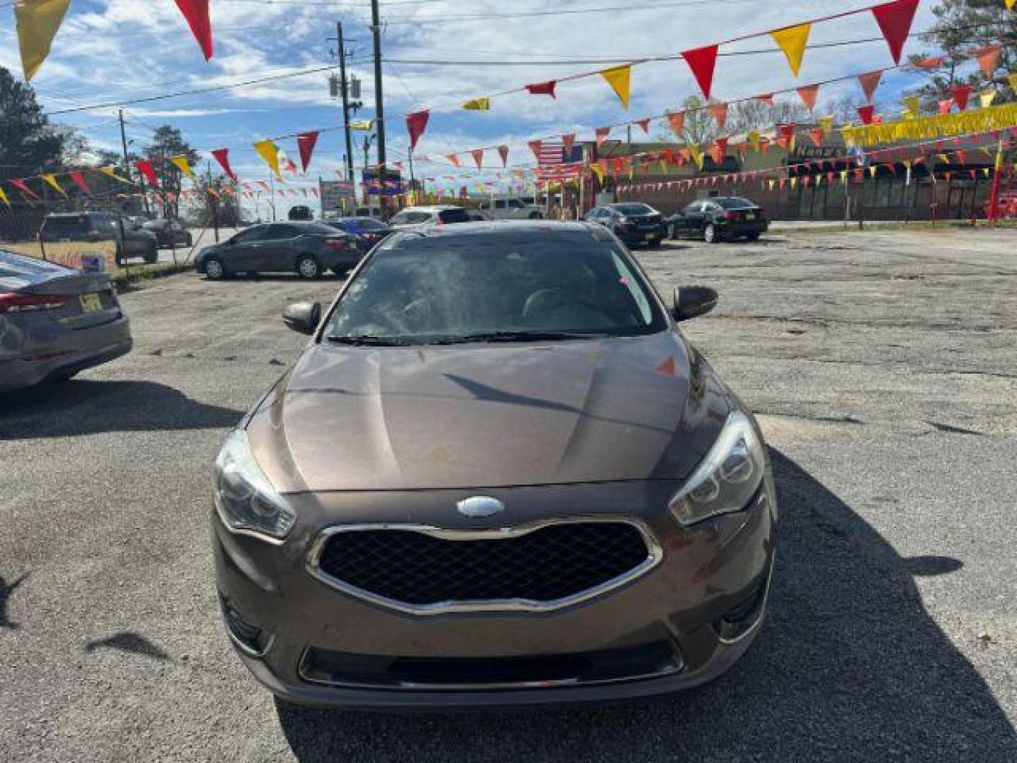 2014 Brown Kia Cadenza Limited (KNALN4D78E5) with an 3.3L V6 DOHC 24V engine, 6-Speed Automatic transmission, located at 1806 Veterans Memorial Hwy SW, Austell, GA, 30168, (770) 944-9558, 33.817959, -84.606987 - Photo#0