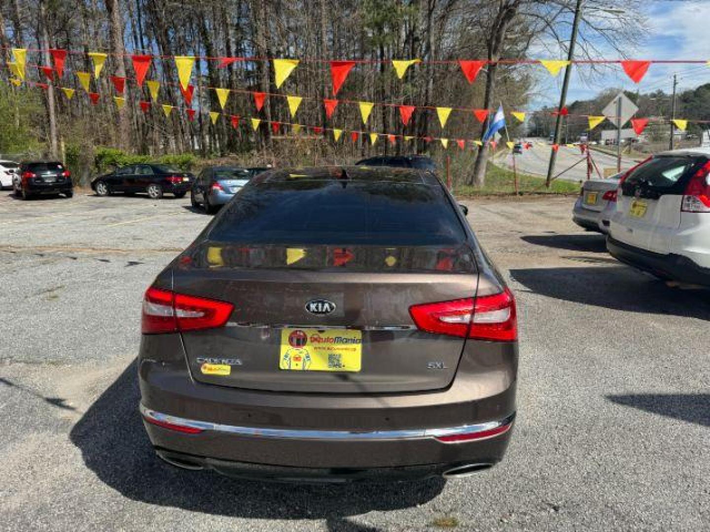 2014 Brown Kia Cadenza Limited (KNALN4D78E5) with an 3.3L V6 DOHC 24V engine, 6-Speed Automatic transmission, located at 1806 Veterans Memorial Hwy SW, Austell, GA, 30168, (770) 944-9558, 33.817959, -84.606987 - Photo#3