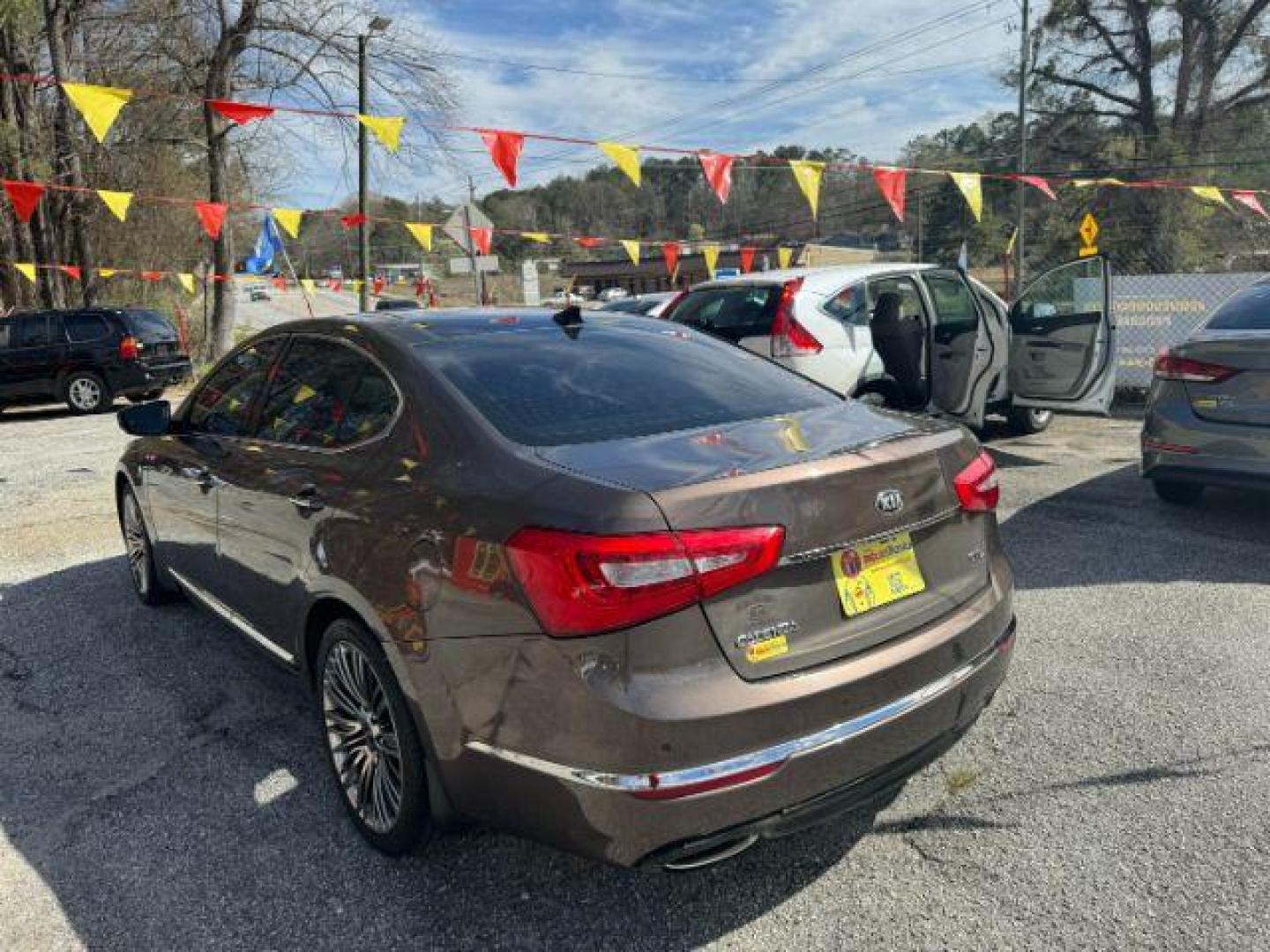 2014 Brown Kia Cadenza Limited (KNALN4D78E5) with an 3.3L V6 DOHC 24V engine, 6-Speed Automatic transmission, located at 1806 Veterans Memorial Hwy SW, Austell, GA, 30168, (770) 944-9558, 33.817959, -84.606987 - Photo#5