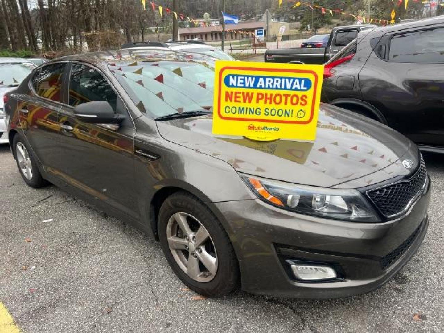 2014 Brown Kia Optima LX (5XXGM4A73EG) with an 2.4L L4 DOHC 16V engine, 6-Speed Automatic transmission, located at 1806 Veterans Memorial Hwy SW, Austell, GA, 30168, (770) 944-9558, 33.817959, -84.606987 - Photo#0