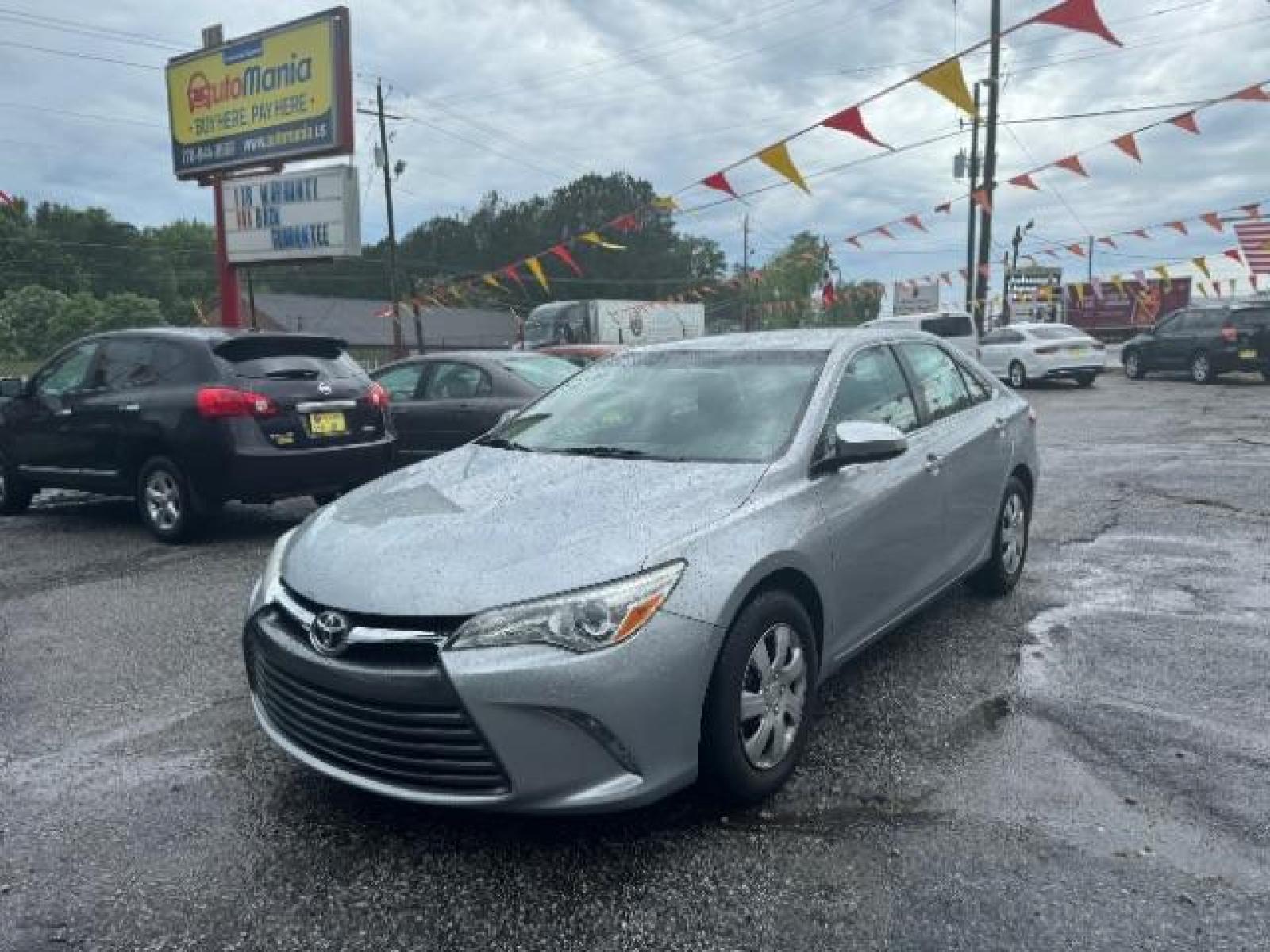 2017 Silver Toyota Camry LE (4T1BF1FK0HU) with an 2.5L L4 DOHC 16V engine, 6-Speed Automatic transmission, located at 1806 Veterans Memorial Hwy SW, Austell, GA, 30168, (770) 944-9558, 33.817959, -84.606987 - Photo #0