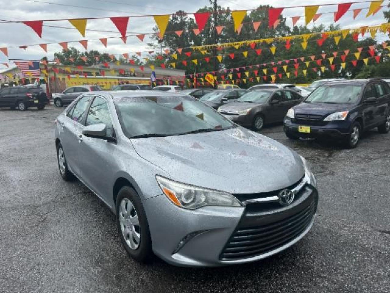 2017 Silver Toyota Camry LE (4T1BF1FK0HU) with an 2.5L L4 DOHC 16V engine, 6-Speed Automatic transmission, located at 1806 Veterans Memorial Hwy SW, Austell, GA, 30168, (770) 944-9558, 33.817959, -84.606987 - Photo #2