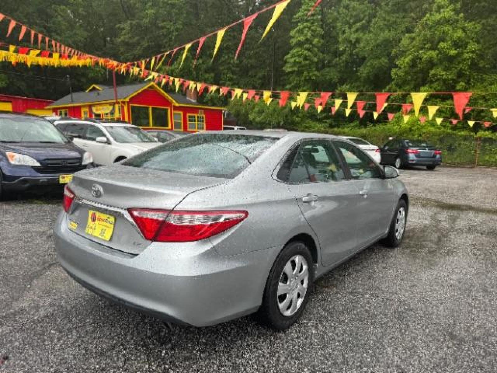 2017 Silver Toyota Camry LE (4T1BF1FK0HU) with an 2.5L L4 DOHC 16V engine, 6-Speed Automatic transmission, located at 1806 Veterans Memorial Hwy SW, Austell, GA, 30168, (770) 944-9558, 33.817959, -84.606987 - Photo #3