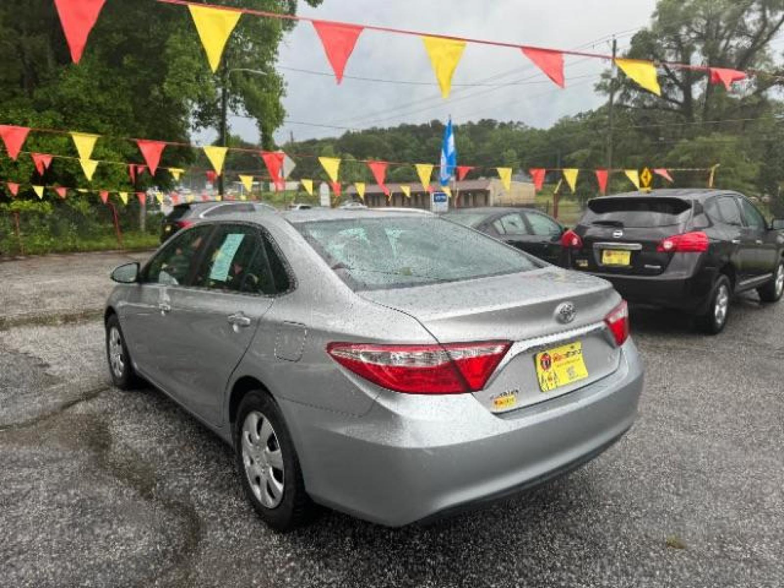 2017 Silver Toyota Camry LE (4T1BF1FK0HU) with an 2.5L L4 DOHC 16V engine, 6-Speed Automatic transmission, located at 1806 Veterans Memorial Hwy SW, Austell, GA, 30168, (770) 944-9558, 33.817959, -84.606987 - Photo #5