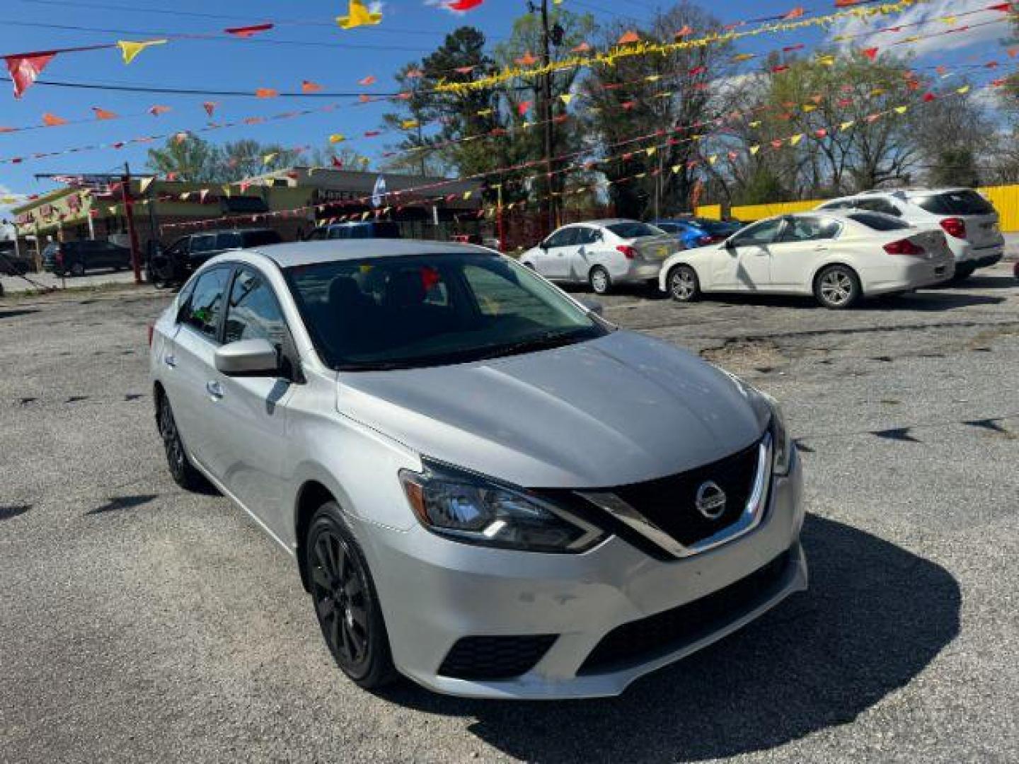 2019 Silver Nissan Sentra S CVT (3N1AB7AP6KY) with an 1.8L L4 SFI DOHC 16V engine, Continuously Variable Transmission transmission, located at 1806 Veterans Memorial Hwy SW, Austell, GA, 30168, (770) 944-9558, 33.817959, -84.606987 - Photo#0