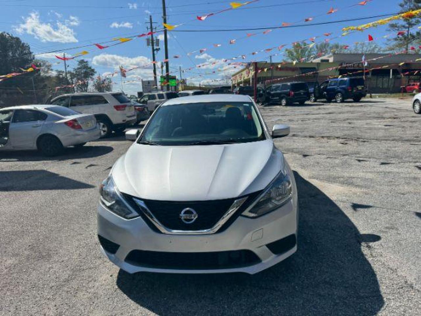 2019 Silver Nissan Sentra S CVT (3N1AB7AP6KY) with an 1.8L L4 SFI DOHC 16V engine, Continuously Variable Transmission transmission, located at 1806 Veterans Memorial Hwy SW, Austell, GA, 30168, (770) 944-9558, 33.817959, -84.606987 - Photo#1