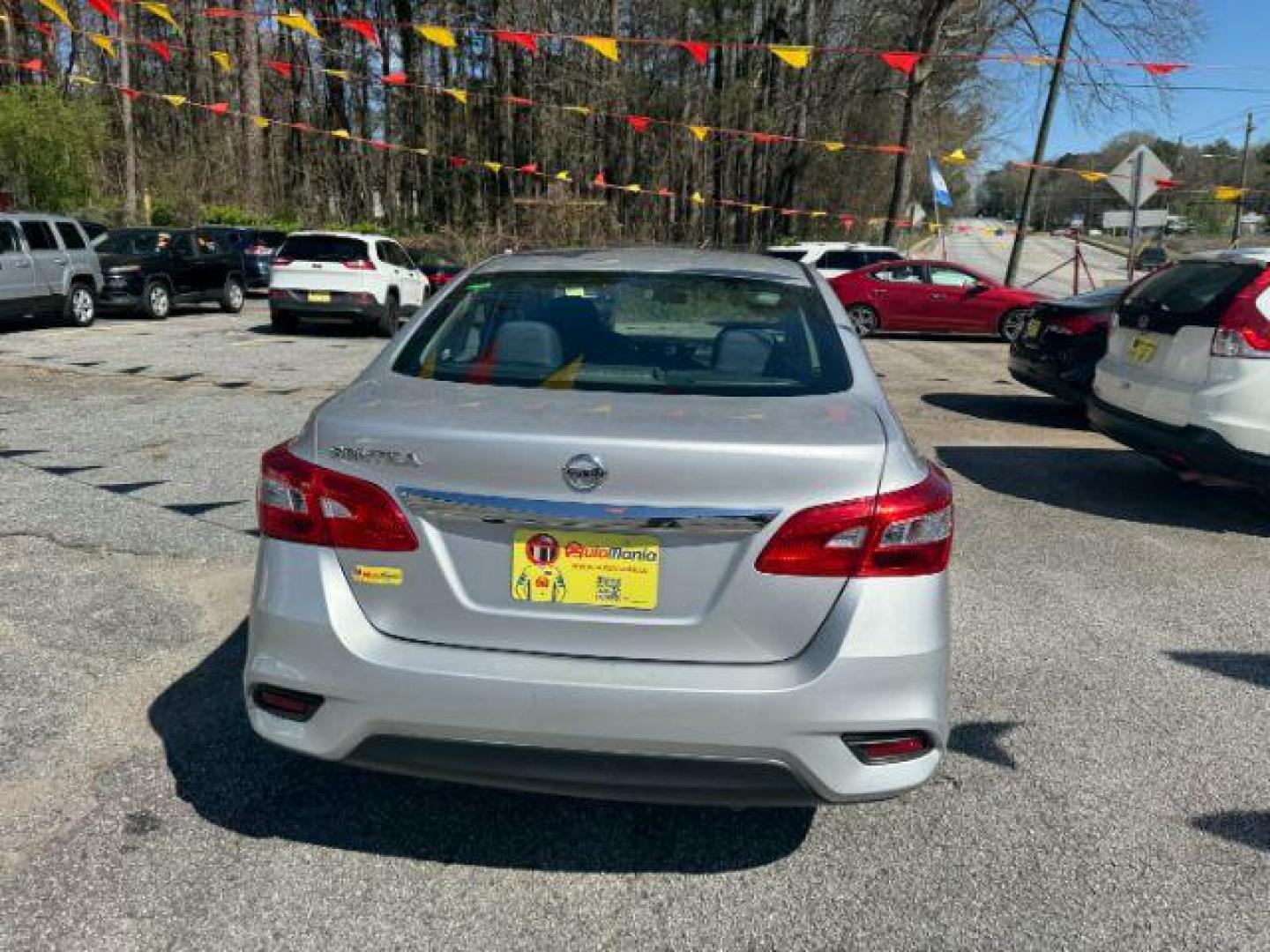 2019 Silver Nissan Sentra S CVT (3N1AB7AP6KY) with an 1.8L L4 SFI DOHC 16V engine, Continuously Variable Transmission transmission, located at 1806 Veterans Memorial Hwy SW, Austell, GA, 30168, (770) 944-9558, 33.817959, -84.606987 - Photo#4