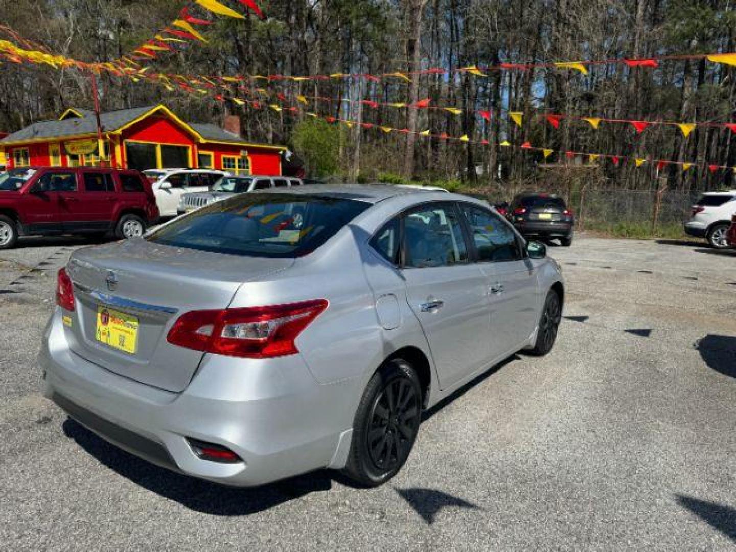 2019 Silver Nissan Sentra S CVT (3N1AB7AP6KY) with an 1.8L L4 SFI DOHC 16V engine, Continuously Variable Transmission transmission, located at 1806 Veterans Memorial Hwy SW, Austell, GA, 30168, (770) 944-9558, 33.817959, -84.606987 - Photo#3