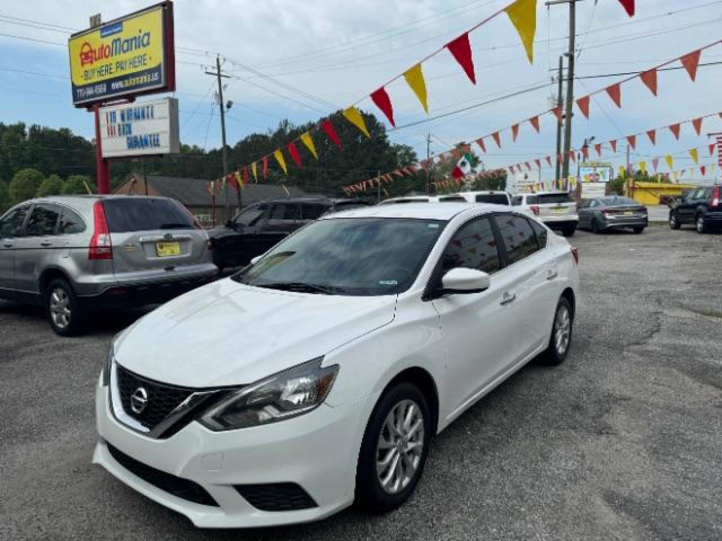 2018 White Nissan Sentra S CVT (3N1AB7AP5JL) with an 1.8L L4 SFI DOHC 16V engine, Continuously Variable Transmission transmission, located at 1806 Veterans Memorial Hwy SW, Austell, GA, 30168, (770) 944-9558, 33.817959, -84.606987 - Photo#0