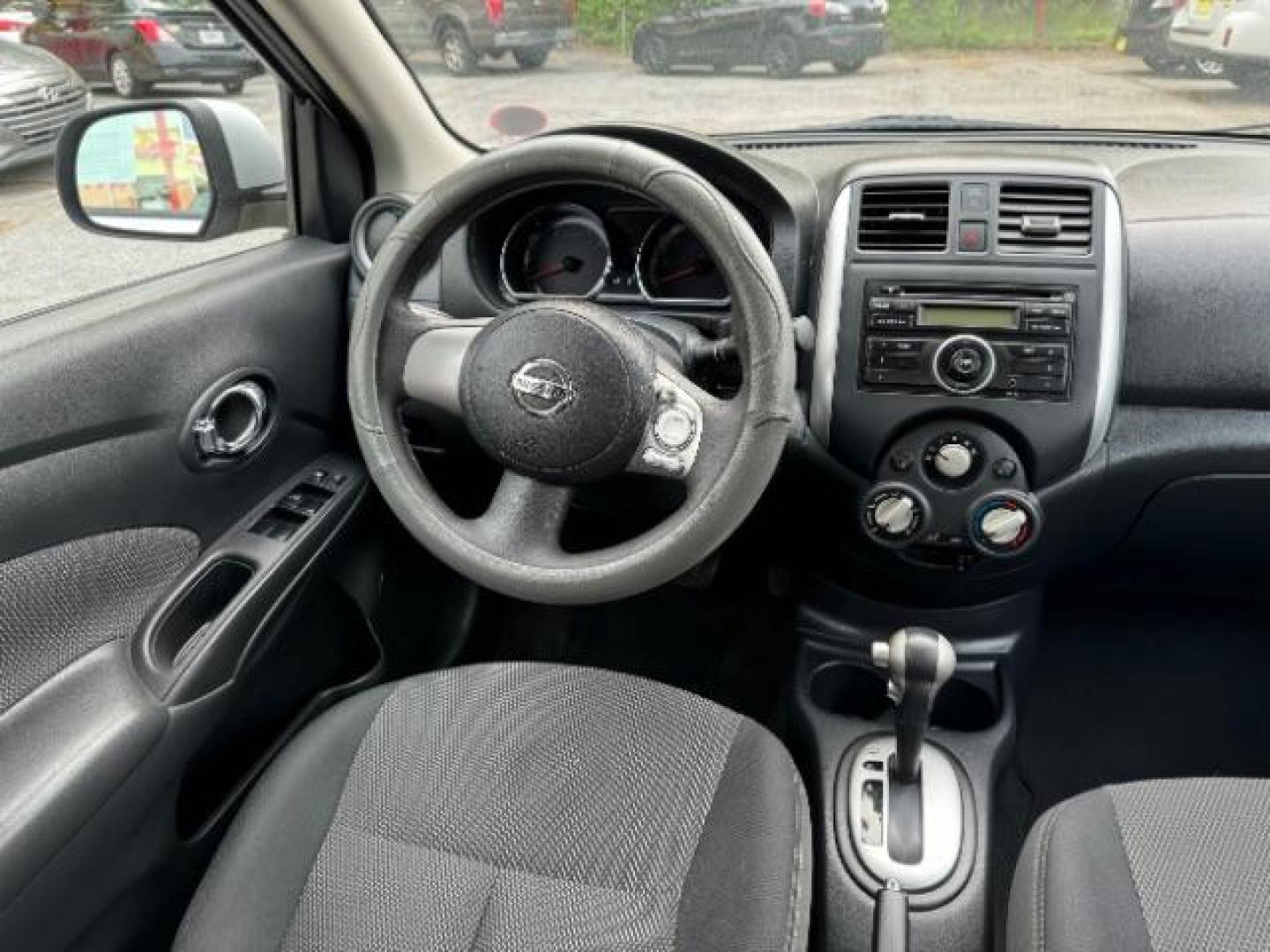 2014 Silver Nissan Versa 1.6 S 4A (3N1CN7AP5EL) with an 1.6L L4 DOHC 16V engine, 4-Speed Automatic transmission, located at 1806 Veterans Memorial Hwy SW, Austell, GA, 30168, (770) 944-9558, 33.817959, -84.606987 - Photo#12