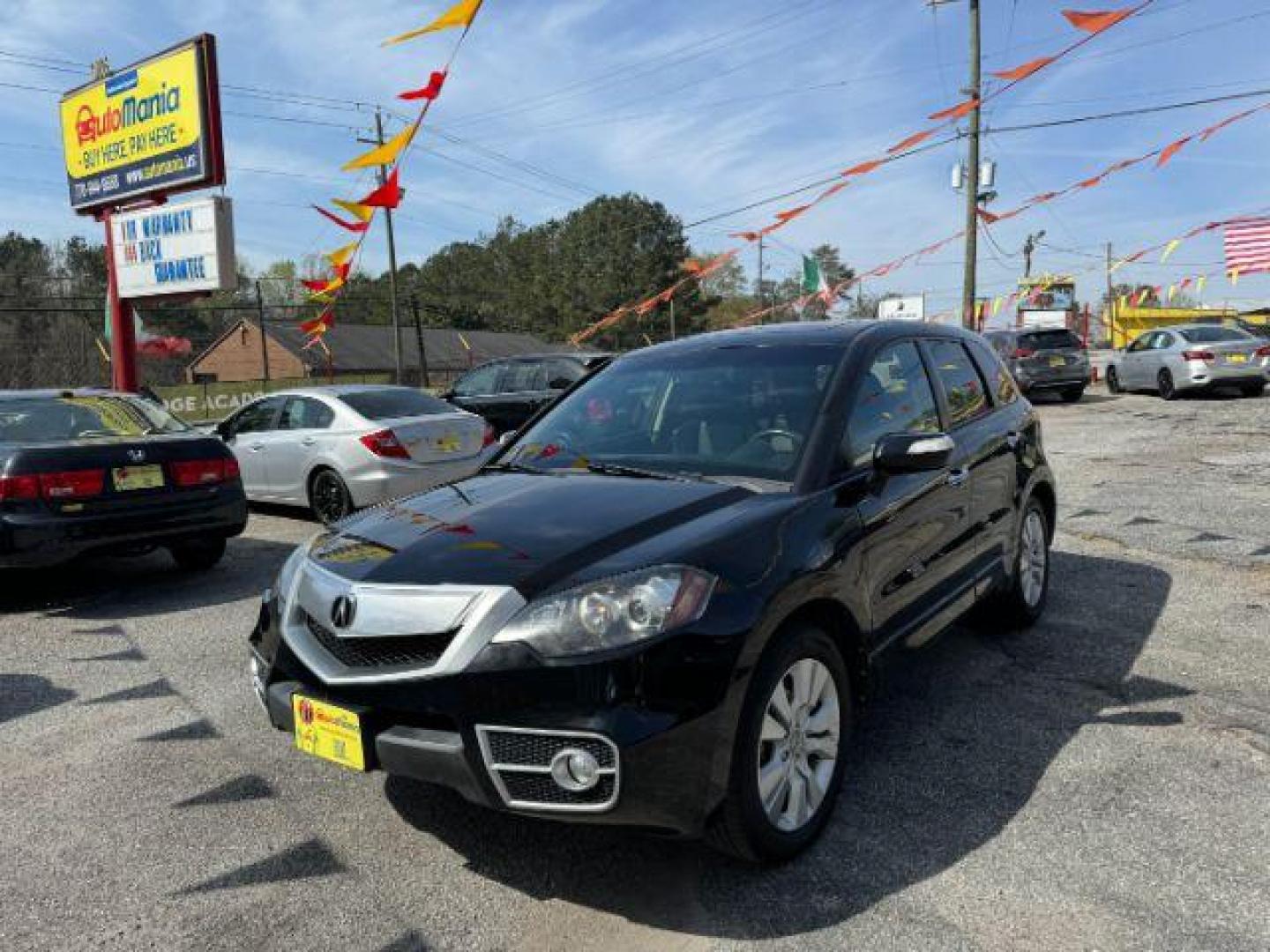 2010 Black Acura RDX 5-Spd AT SH-AWD with Technology Package (5J8TB1H50AA) with an 2.3L L4 DOHC 16V engine, 5-Speed Automatic transmission, located at 1806 Veterans Memorial Hwy SW, Austell, GA, 30168, (770) 944-9558, 33.817959, -84.606987 - Photo#0