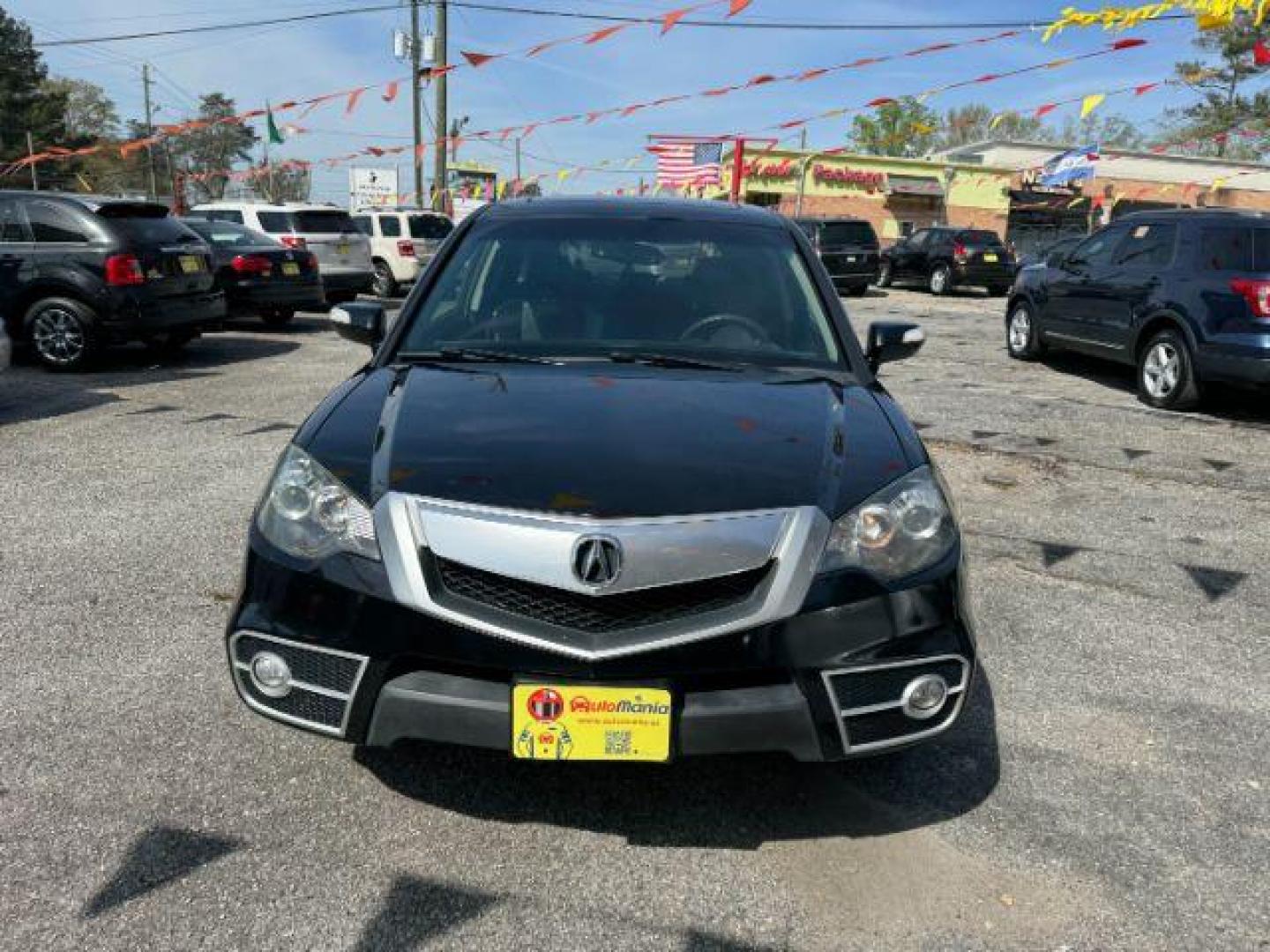 2010 Black Acura RDX 5-Spd AT SH-AWD with Technology Package (5J8TB1H50AA) with an 2.3L L4 DOHC 16V engine, 5-Speed Automatic transmission, located at 1806 Veterans Memorial Hwy SW, Austell, GA, 30168, (770) 944-9558, 33.817959, -84.606987 - Photo#1