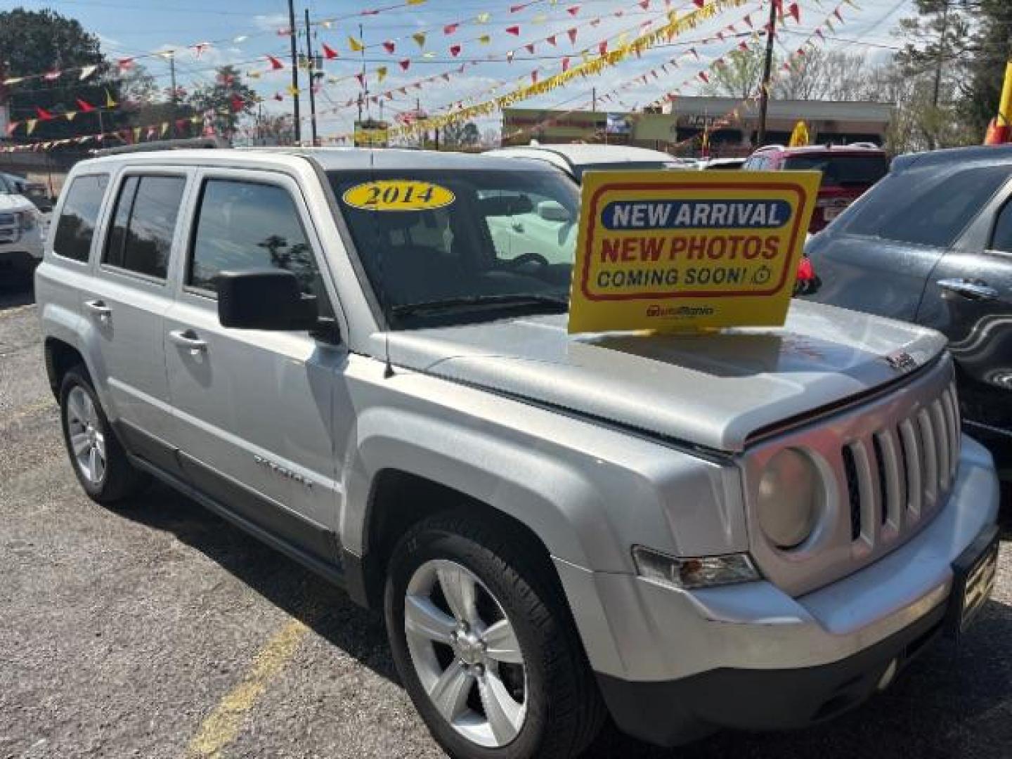 2014 Silver Jeep Patriot Latitude 2WD (1C4NJPFA8ED) with an 2.0L L4 DOHC 16V engine, Continuously Variable Transmission transmission, located at 1806 Veterans Memorial Hwy SW, Austell, GA, 30168, (770) 944-9558, 33.817959, -84.606987 - Photo#0