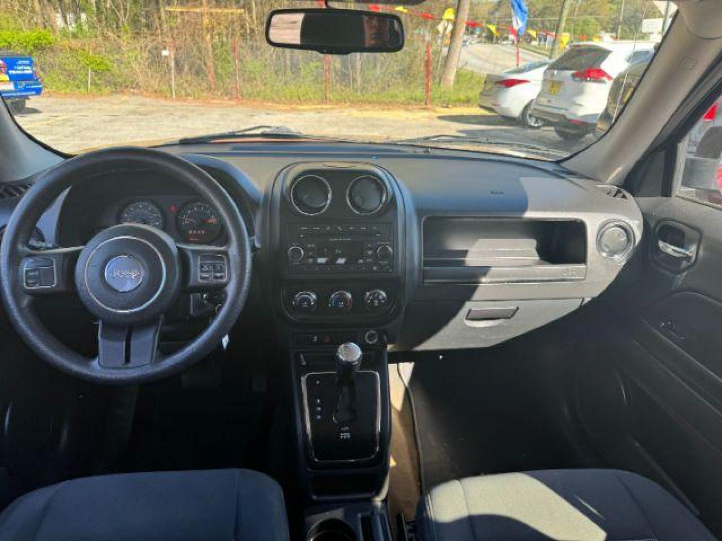 2016 Red Jeep Patriot Sport 4WD (1C4NJRBB6GD) with an 2.4L L4 DOHC 16V engine, located at 1806 Veterans Memorial Hwy SW, Austell, GA, 30168, (770) 944-9558, 33.817959, -84.606987 - Photo#13