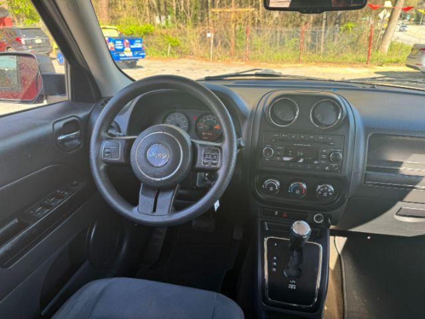 2016 Red Jeep Patriot Sport 4WD (1C4NJRBB6GD) with an 2.4L L4 DOHC 16V engine, located at 1806 Veterans Memorial Hwy SW, Austell, GA, 30168, (770) 944-9558, 33.817959, -84.606987 - Photo#18