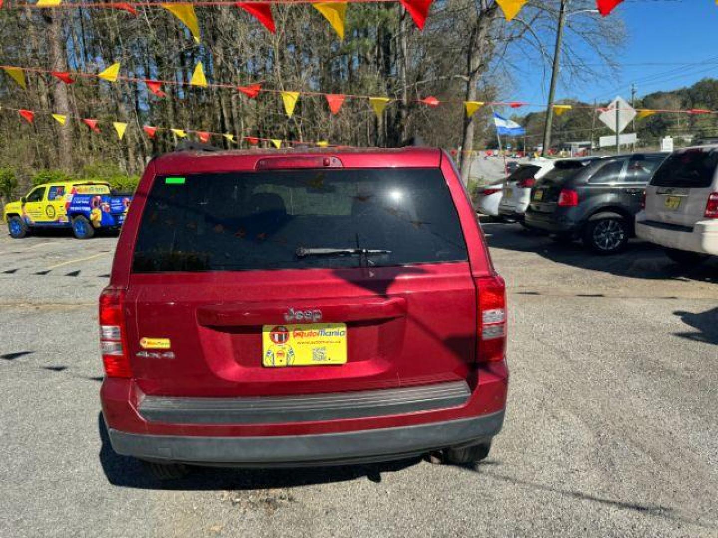 2016 Red Jeep Patriot Sport 4WD (1C4NJRBB6GD) with an 2.4L L4 DOHC 16V engine, located at 1806 Veterans Memorial Hwy SW, Austell, GA, 30168, (770) 944-9558, 33.817959, -84.606987 - Photo#4