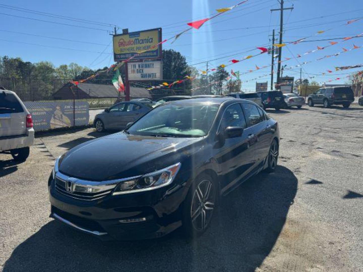 2016 Black Honda Accord Sport Sedan CVT (1HGCR2F50GA) with an 2.4L L4 DOHC 16V engine, Continuously Variable Transmission transmission, located at 1806 Veterans Memorial Hwy SW, Austell, GA, 30168, (770) 944-9558, 33.817959, -84.606987 - Photo#0