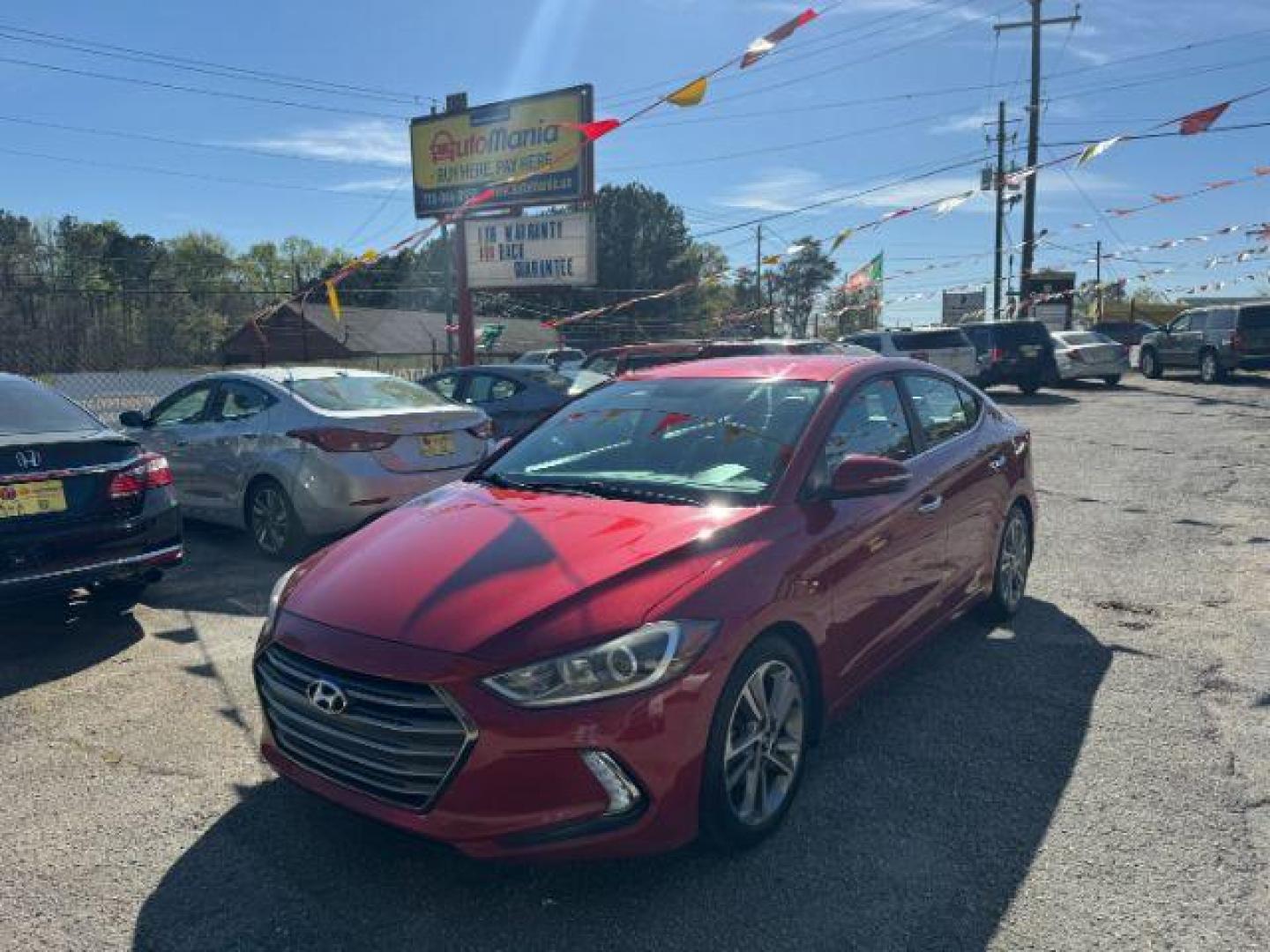 2017 Red Hyundai Elantra Limited (5NPD84LFXHH) with an 1.8L L4 DOHC 16V engine, 6-Speed Automatic transmission, located at 1806 Veterans Memorial Hwy SW, Austell, GA, 30168, (770) 944-9558, 33.817959, -84.606987 - Photo#0