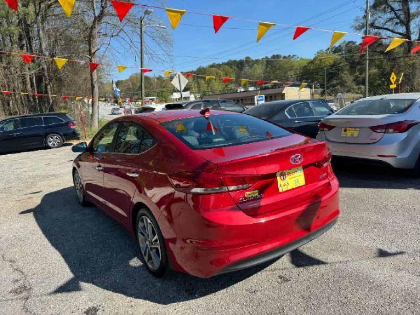 2017 Red Hyundai Elantra Limited (5NPD84LFXHH) with an 1.8L L4 DOHC 16V engine, 6-Speed Automatic transmission, located at 1806 Veterans Memorial Hwy SW, Austell, GA, 30168, (770) 944-9558, 33.817959, -84.606987 - Photo#4