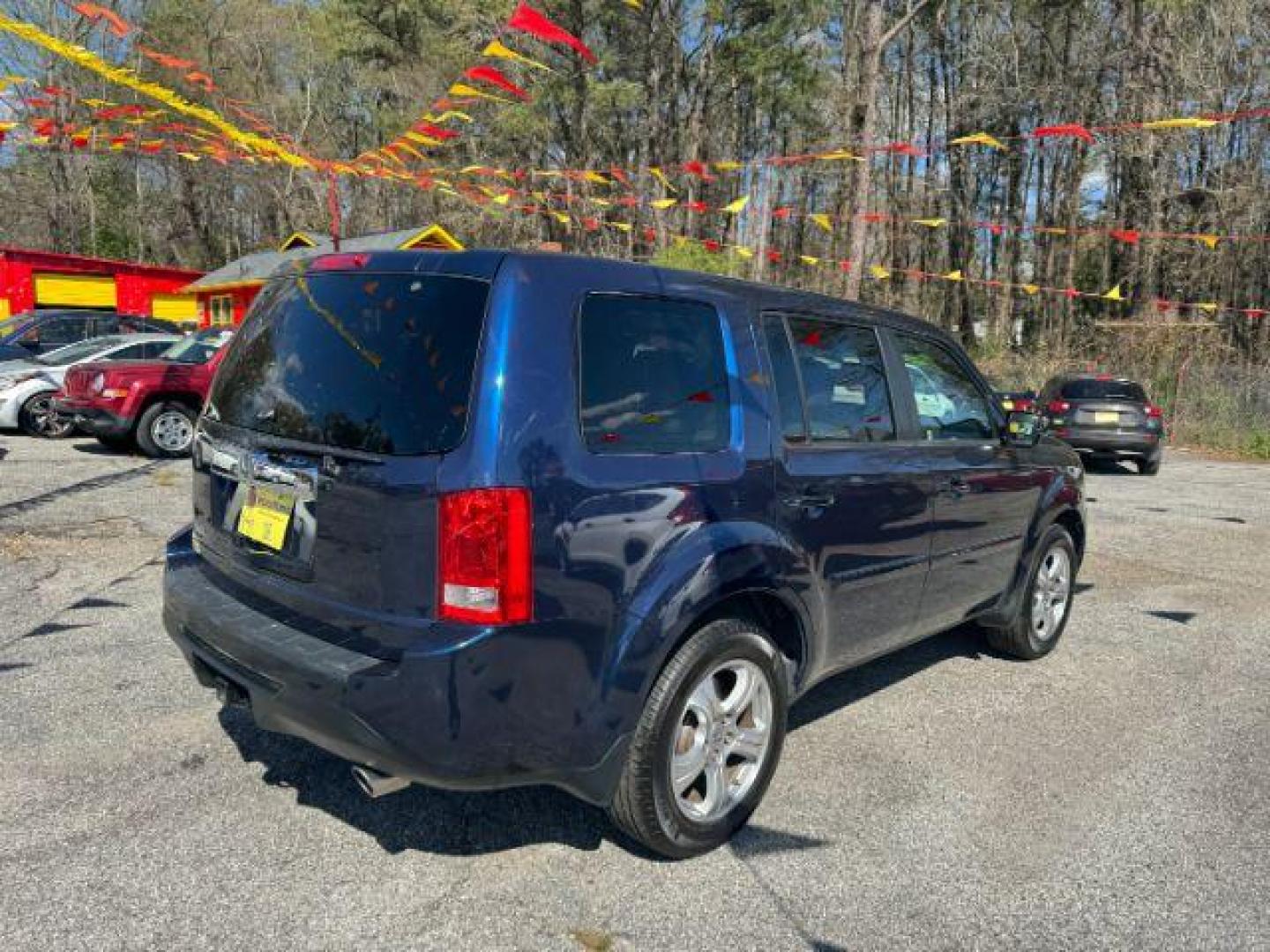 2015 BLUE Honda Pilot EX-L 2WD 5-Spd AT (5FNYF3H55FB) with an 3.5L V6 SOHC 24V engine, 5-Speed Automatic transmission, located at 1806 Veterans Memorial Hwy SW, Austell, GA, 30168, (770) 944-9558, 33.817959, -84.606987 - Photo#3