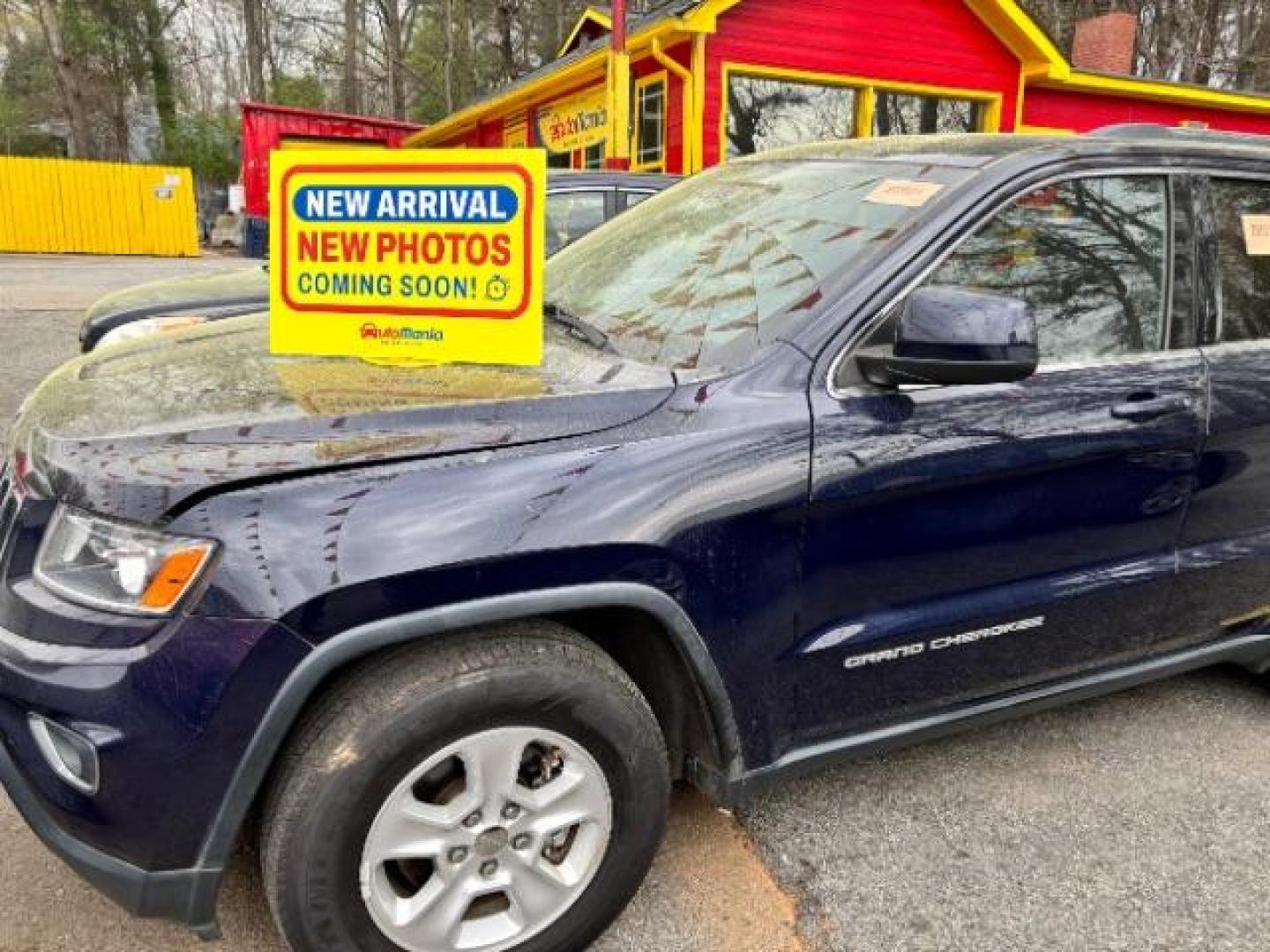 2015 Blue Jeep Grand Cherokee Laredo 2WD (1C4RJEAG1FC) with an 3.6L V6 DOHC 24V engine, 8-Speed Automatic transmission, located at 1806 Veterans Memorial Hwy SW, Austell, GA, 30168, (770) 944-9558, 33.817959, -84.606987 - Photo#0