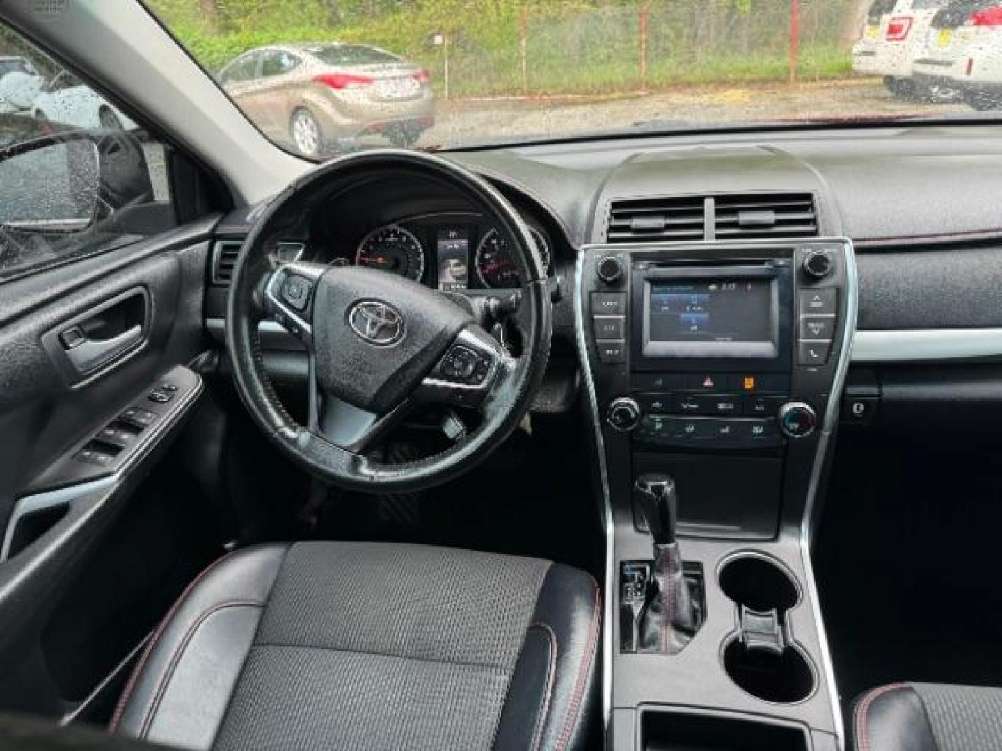 2016 Red Toyota Camry SE (4T1BF1FK4GU) with an 2.5L L4 DOHC 16V engine, 6-Speed Automatic transmission, located at 1806 Veterans Memorial Hwy SW, Austell, GA, 30168, (770) 944-9558, 33.817959, -84.606987 - Photo#11