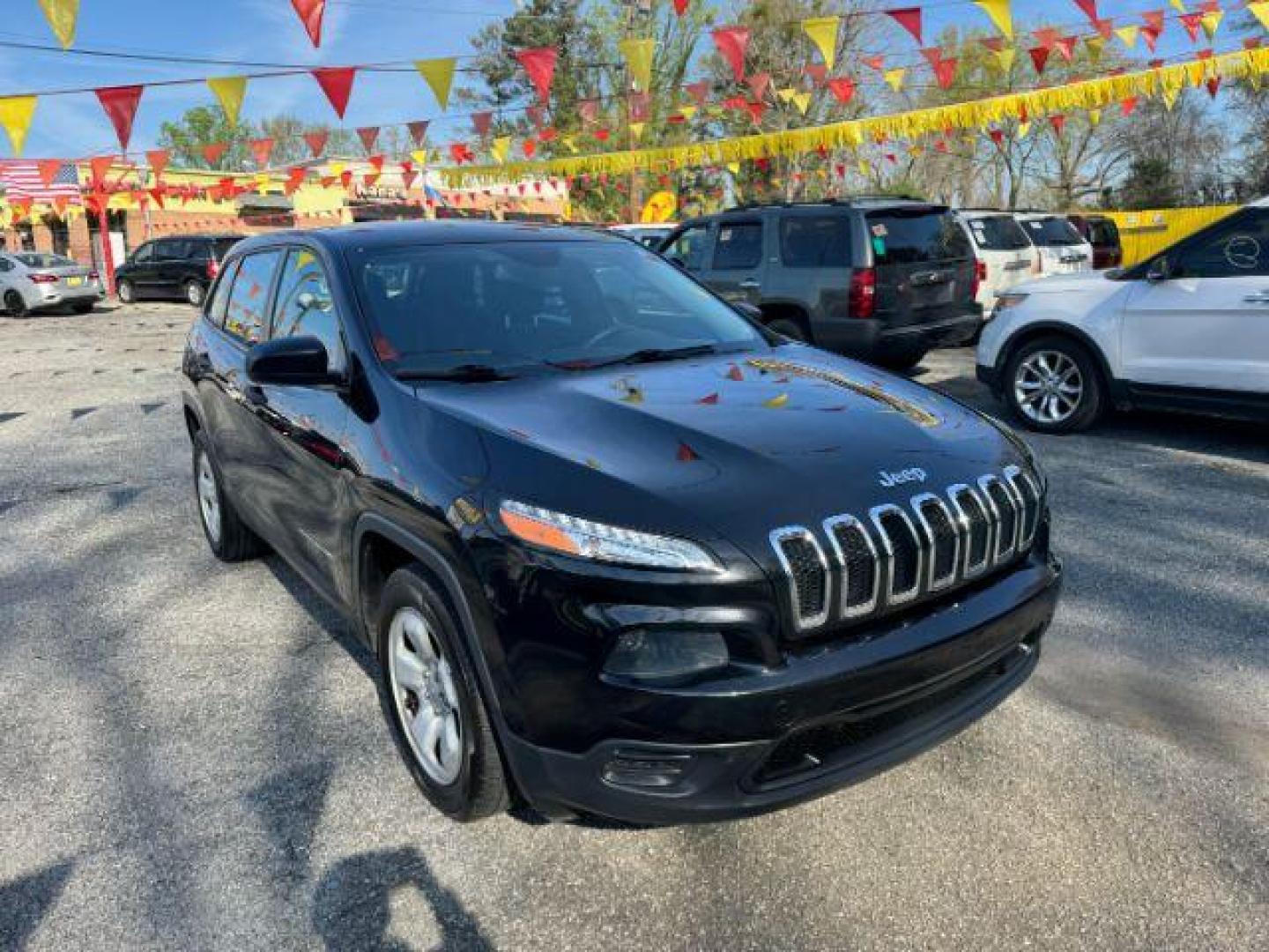 2014 Black Jeep Cherokee Sport FWD (1C4PJLAB7EW) with an 2.4L L4 DOHC 16V engine, 9-Speed Automatic transmission, located at 1806 Veterans Memorial Hwy SW, Austell, GA, 30168, (770) 944-9558, 33.817959, -84.606987 - Photo#2