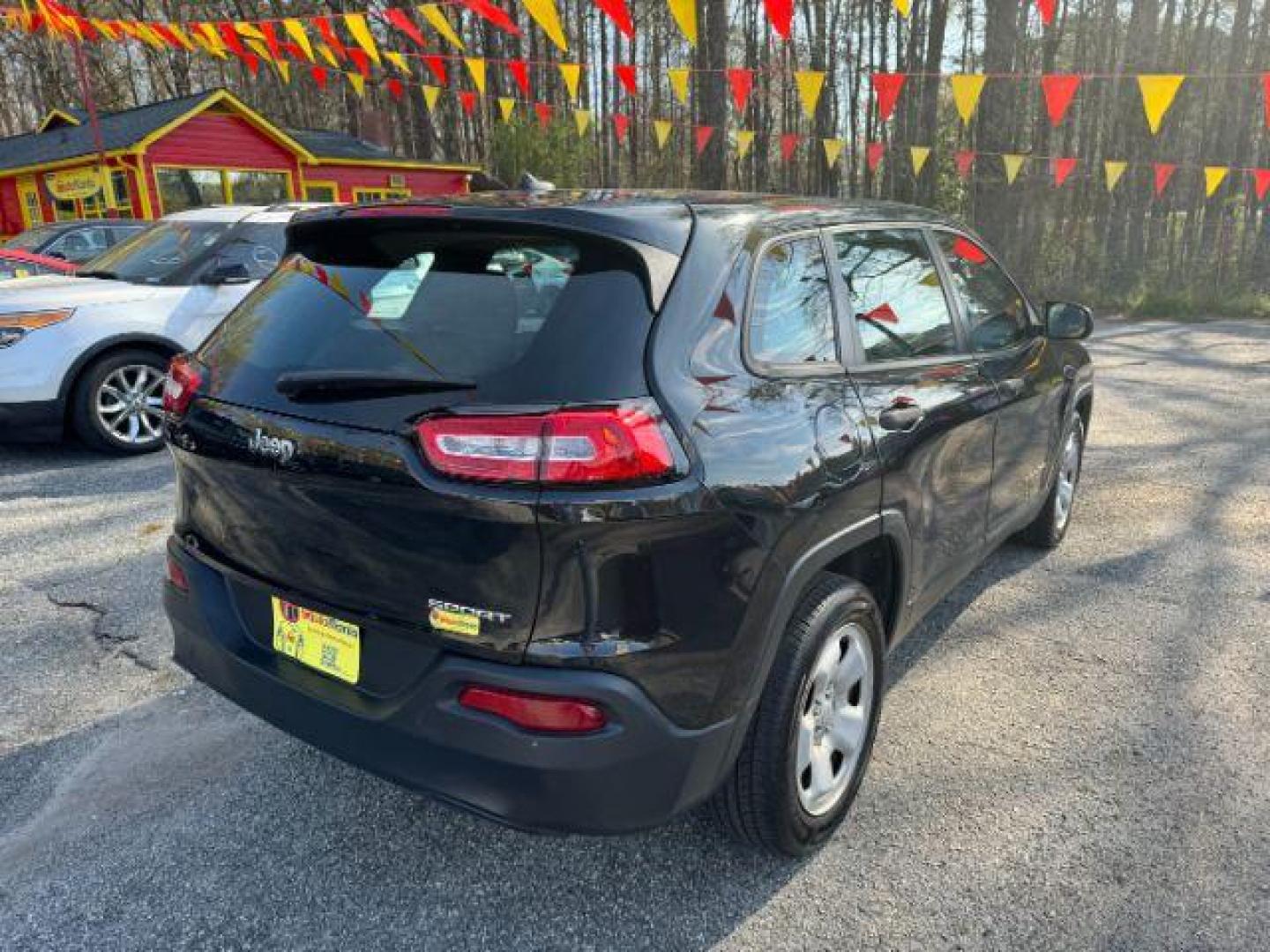 2014 Black Jeep Cherokee Sport FWD (1C4PJLAB7EW) with an 2.4L L4 DOHC 16V engine, 9-Speed Automatic transmission, located at 1806 Veterans Memorial Hwy SW, Austell, GA, 30168, (770) 944-9558, 33.817959, -84.606987 - Photo#3