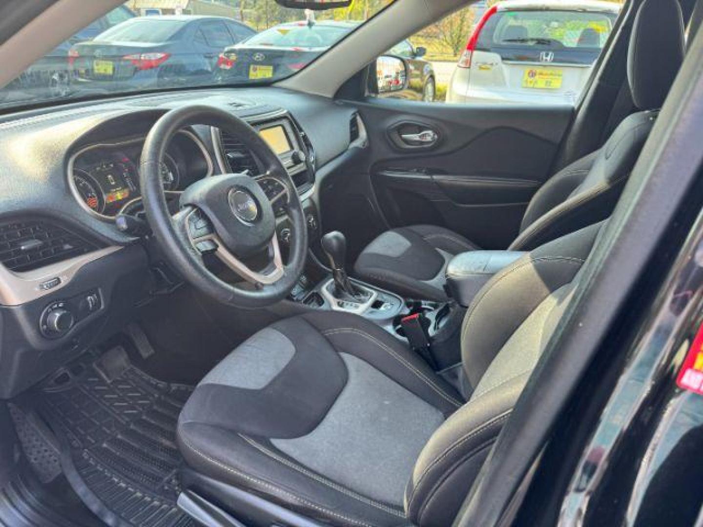 2014 Black Jeep Cherokee Sport FWD (1C4PJLAB7EW) with an 2.4L L4 DOHC 16V engine, 9-Speed Automatic transmission, located at 1806 Veterans Memorial Hwy SW, Austell, GA, 30168, (770) 944-9558, 33.817959, -84.606987 - Photo#6