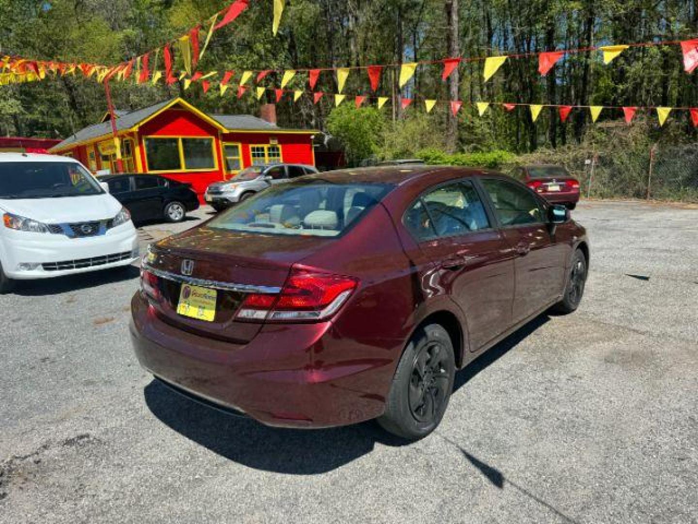 2013 Burgundy Honda Civic LX Sedan 5-Speed AT (19XFB2F55DE) with an 1.8L L4 SOHC 16V engine, 5-Speed Automatic transmission, located at 1806 Veterans Memorial Hwy SW, Austell, GA, 30168, (770) 944-9558, 33.817959, -84.606987 - Photo#3