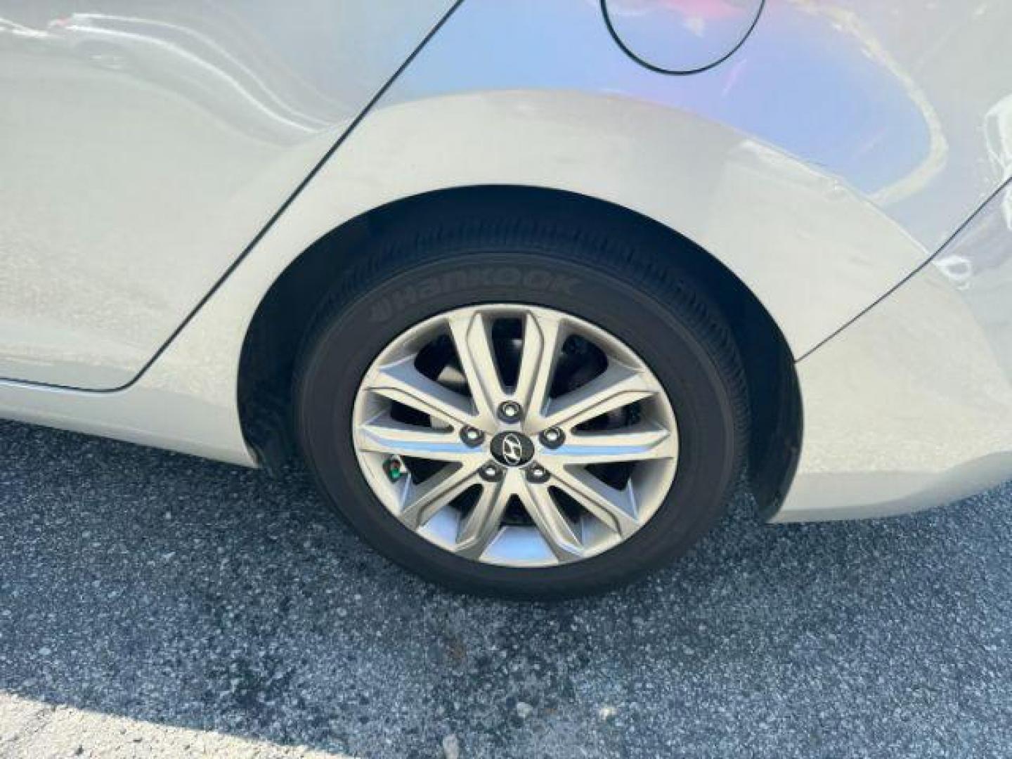 2014 Silver Hyundai Elantra GLS A/T (KMHDH4AE7EU) with an 1.8L L4 DOHC 16V engine, located at 1806 Veterans Memorial Hwy SW, Austell, GA, 30168, (770) 944-9558, 33.817959, -84.606987 - Photo#20