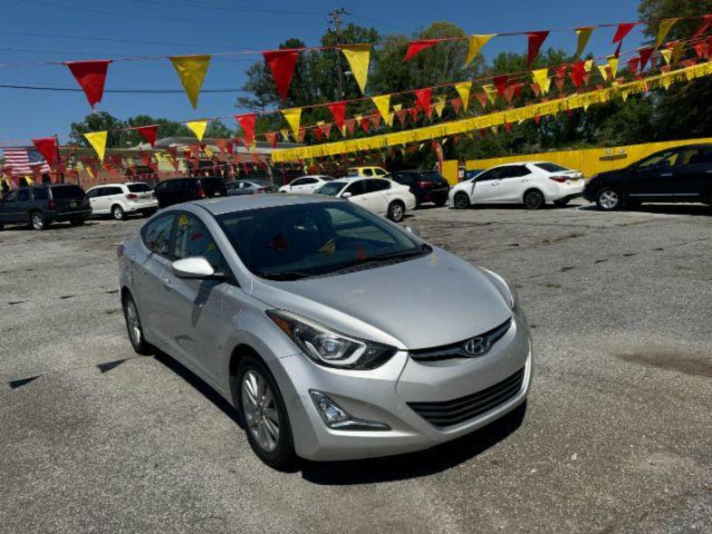 2014 Silver Hyundai Elantra GLS A/T (KMHDH4AE7EU) with an 1.8L L4 DOHC 16V engine, located at 1806 Veterans Memorial Hwy SW, Austell, GA, 30168, (770) 944-9558, 33.817959, -84.606987 - Photo#2