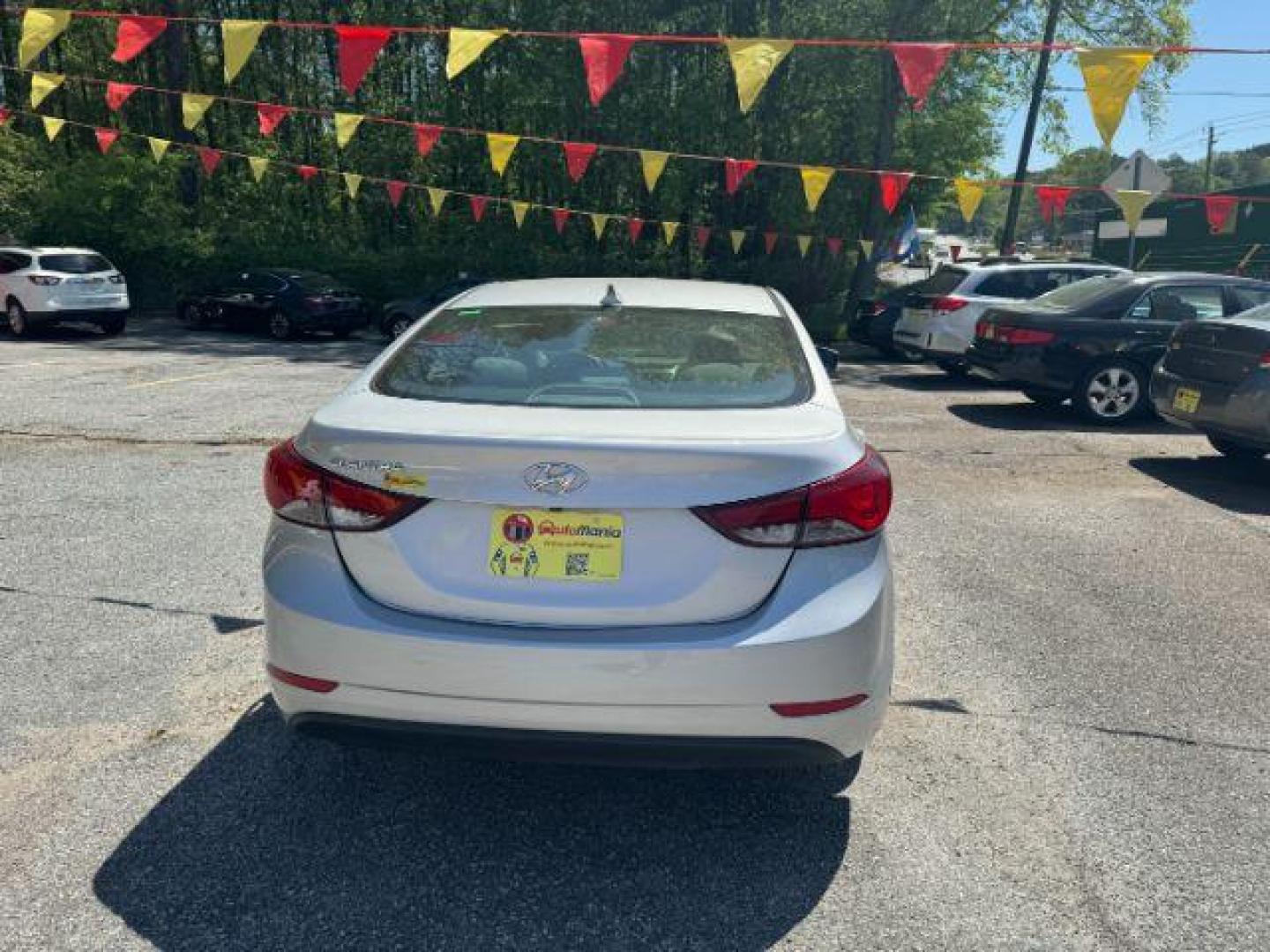 2014 Silver Hyundai Elantra GLS A/T (KMHDH4AE7EU) with an 1.8L L4 DOHC 16V engine, located at 1806 Veterans Memorial Hwy SW, Austell, GA, 30168, (770) 944-9558, 33.817959, -84.606987 - Photo#4