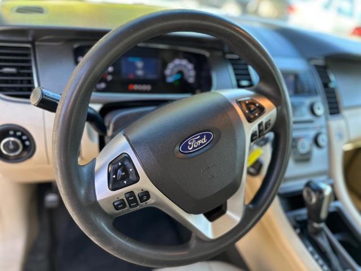 2016 WHITE Ford Taurus SE FWD (1FAHP2D88GG) with an 3.5L V6 DOHC 24V engine, 6-Speed Automatic transmission, located at 1806 Veterans Memorial Hwy SW, Austell, GA, 30168, (770) 944-9558, 33.817959, -84.606987 - Photo#9