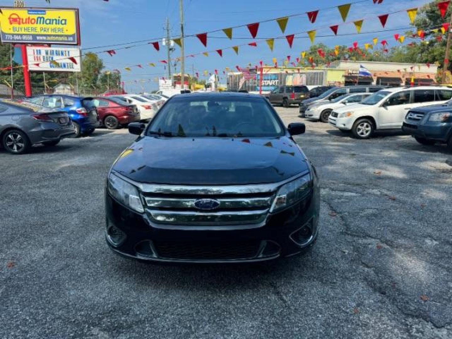 2012 BLACK Ford Fusion SPORT (3FAHP0KC3CR) with an 3.5L V6 DOHC 24V engine, 5-Speed Automatic transmission, located at 1806 Veterans Memorial Hwy SW, Austell, GA, 30168, (770) 944-9558, 33.817959, -84.606987 - Photo#1