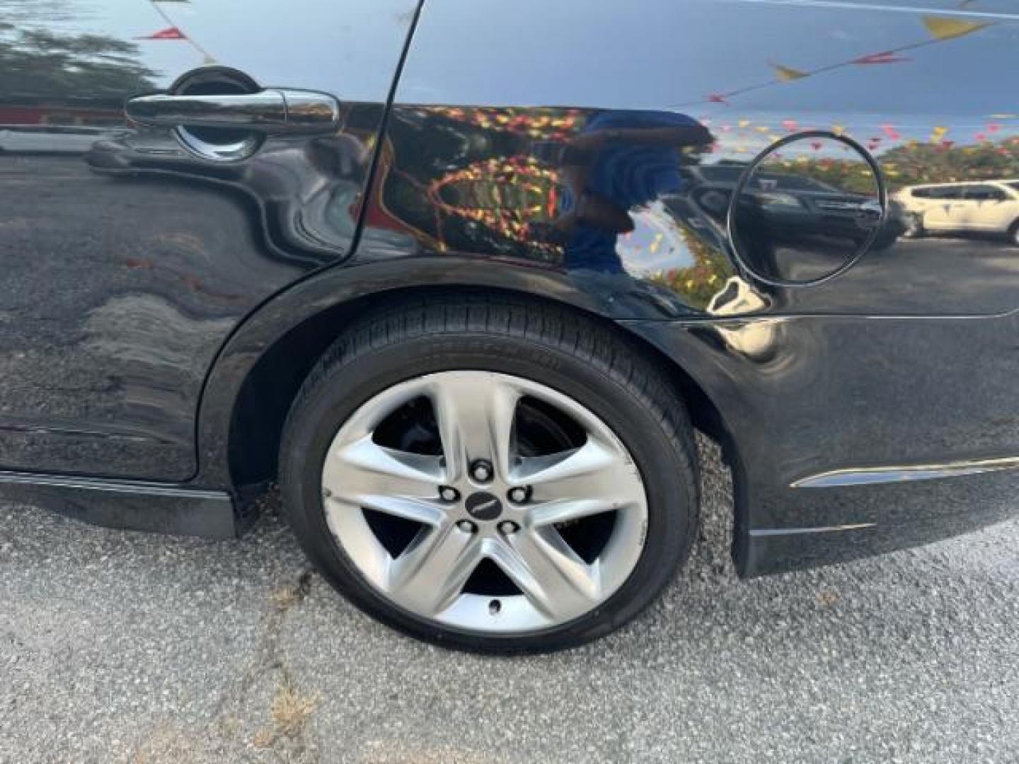 2012 BLACK Ford Fusion SPORT (3FAHP0KC3CR) with an 3.5L V6 DOHC 24V engine, 5-Speed Automatic transmission, located at 1806 Veterans Memorial Hwy SW, Austell, GA, 30168, (770) 944-9558, 33.817959, -84.606987 - Photo#20