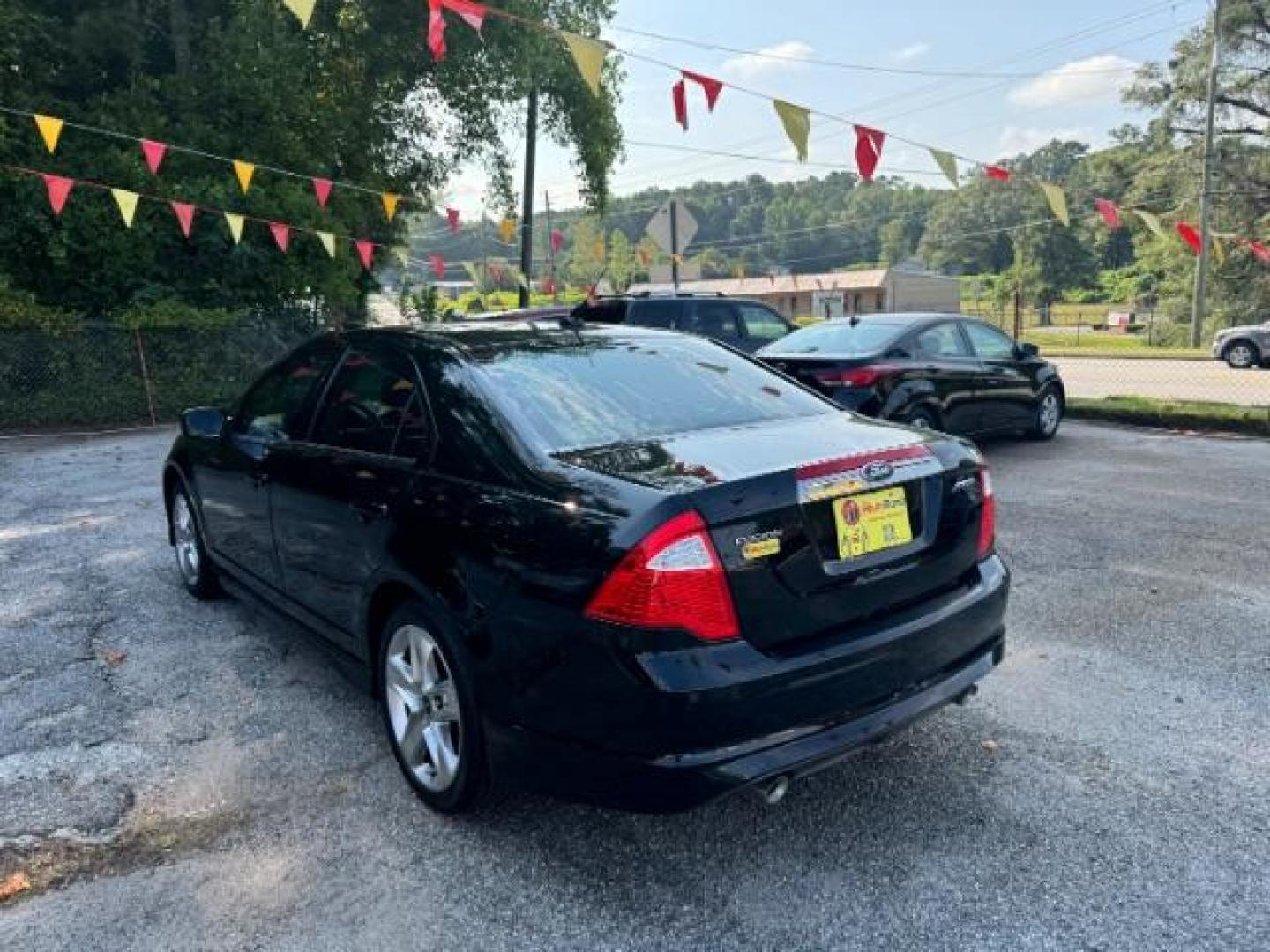 2012 BLACK Ford Fusion SPORT (3FAHP0KC3CR) with an 3.5L V6 DOHC 24V engine, 5-Speed Automatic transmission, located at 1806 Veterans Memorial Hwy SW, Austell, GA, 30168, (770) 944-9558, 33.817959, -84.606987 - Photo#3