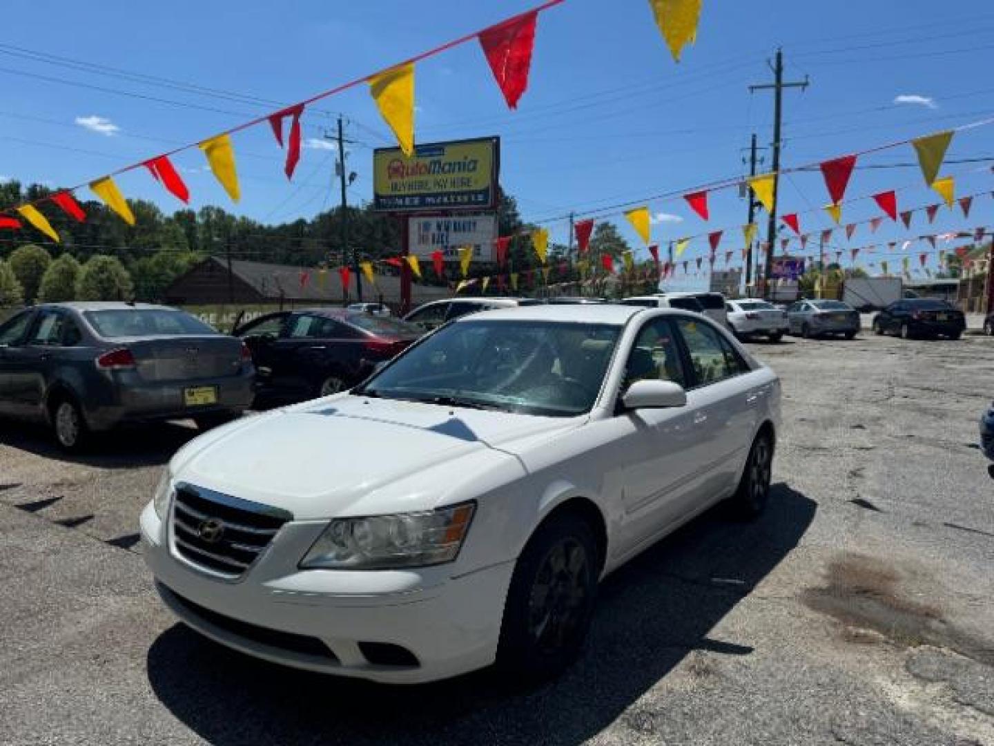 2009 White Hyundai Sonata GLS V6 (5NPET46F69H) with an 3.3L V6 DOHC 24V engine, 5-Speed Automatic transmission, located at 1806 Veterans Memorial Hwy SW, Austell, GA, 30168, (770) 944-9558, 33.817959, -84.606987 - Photo#0