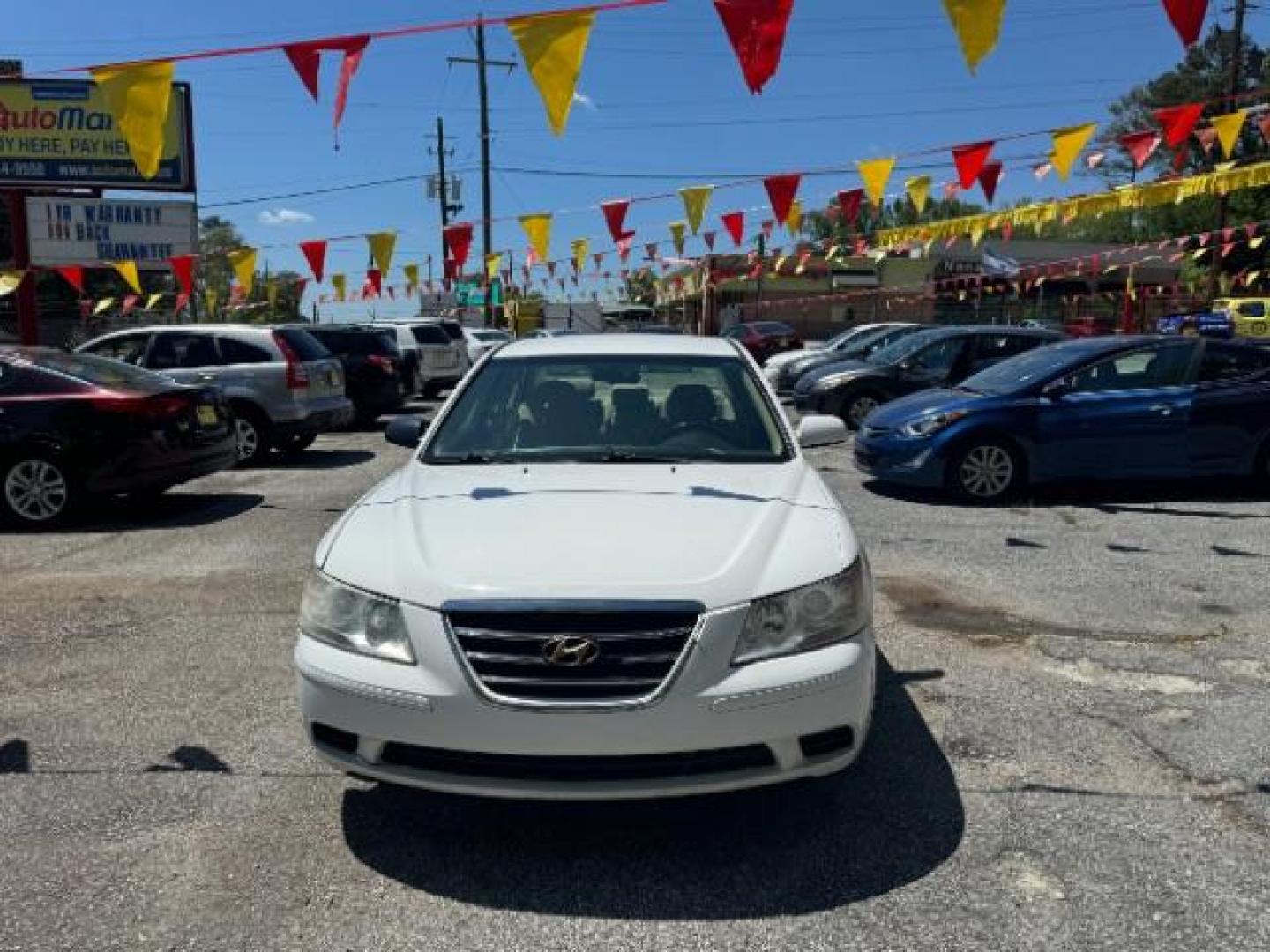 2009 White Hyundai Sonata GLS V6 (5NPET46F69H) with an 3.3L V6 DOHC 24V engine, 5-Speed Automatic transmission, located at 1806 Veterans Memorial Hwy SW, Austell, GA, 30168, (770) 944-9558, 33.817959, -84.606987 - Photo#1